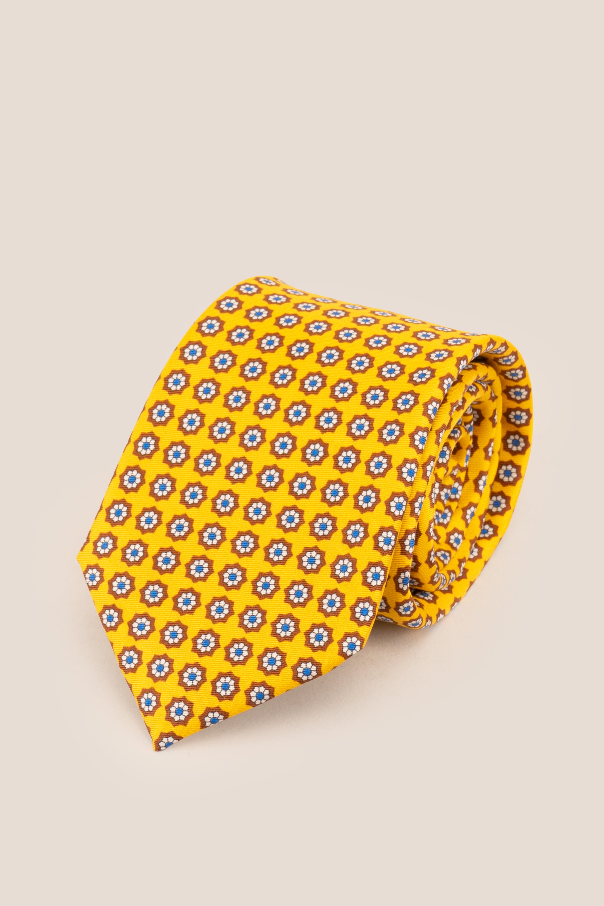 Yellow Floral Print Silk Tie with elegant design, adding sophistication and luxury to formal occasions.