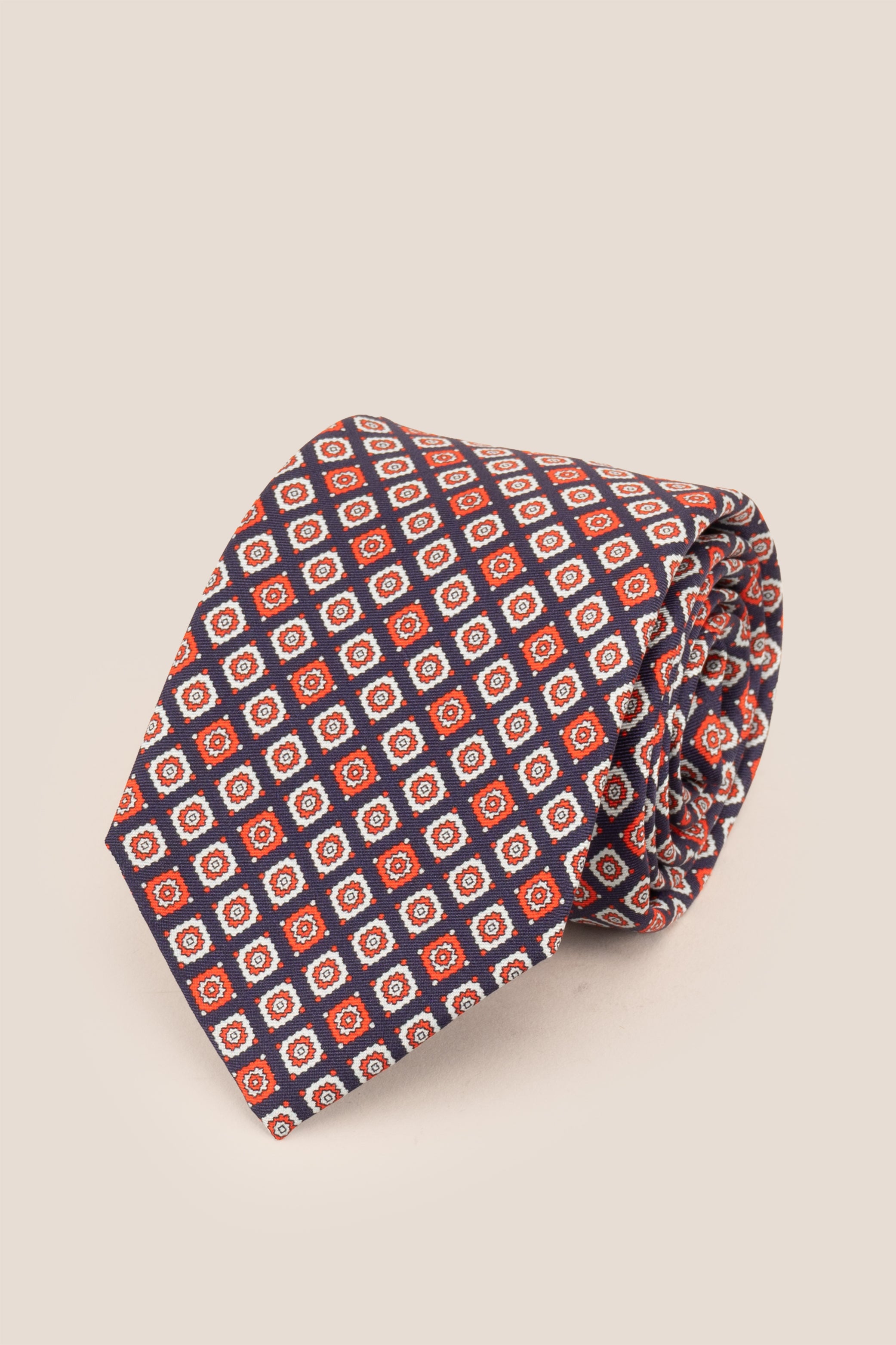 Blue Motif Print Silk Tie with geometric pattern, exuding luxury and sophistication for formal events.