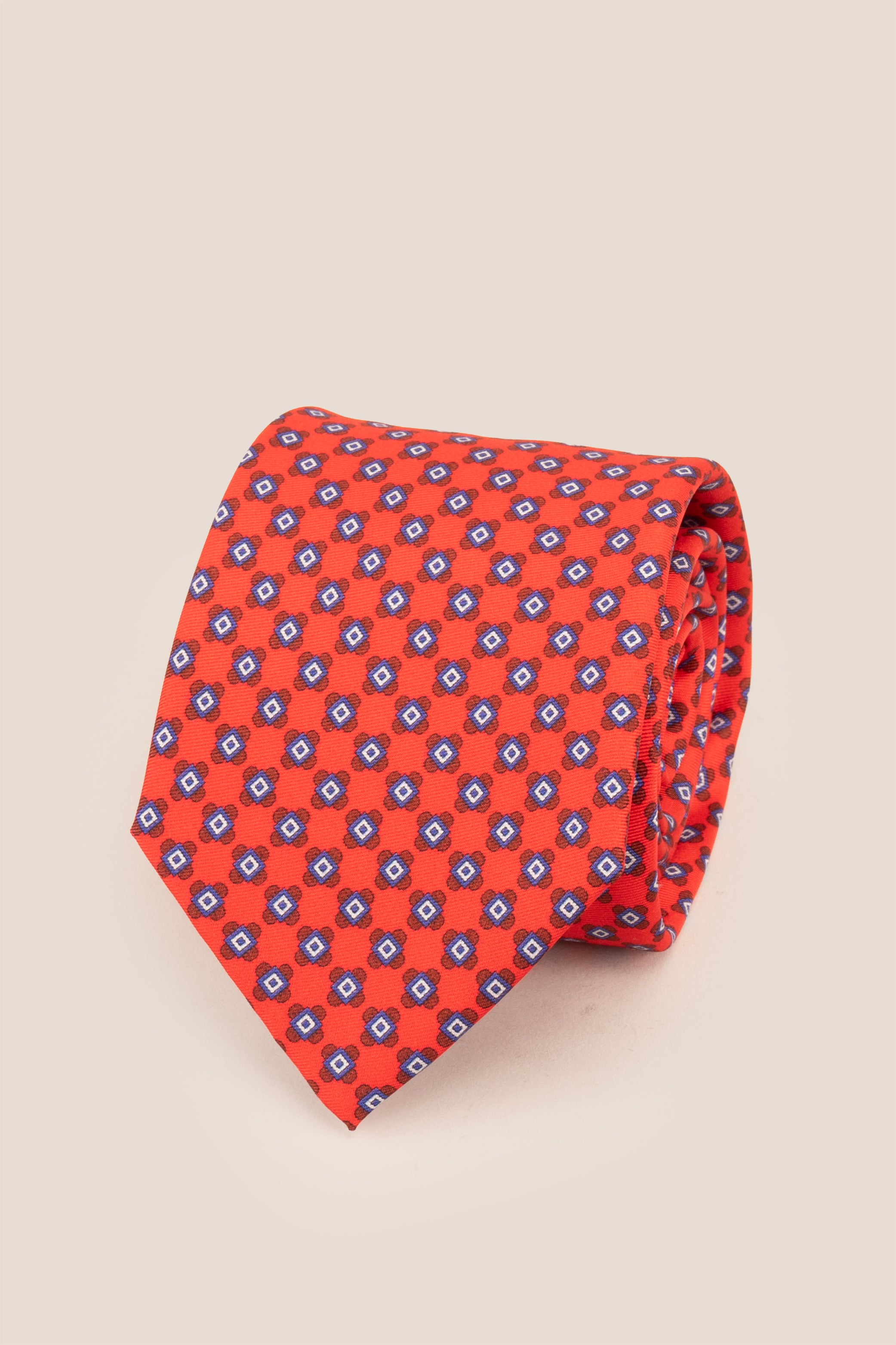Red Squares Geometric Silk Tie with intricate design, offering luxury and elegance for formal occasions.