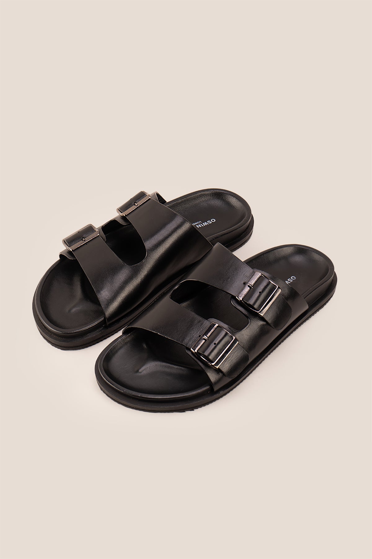 Jude Black leather men's sandals with twin buckle straps and high-quality leather design, ideal for everyday comfort and casual summer wear.
