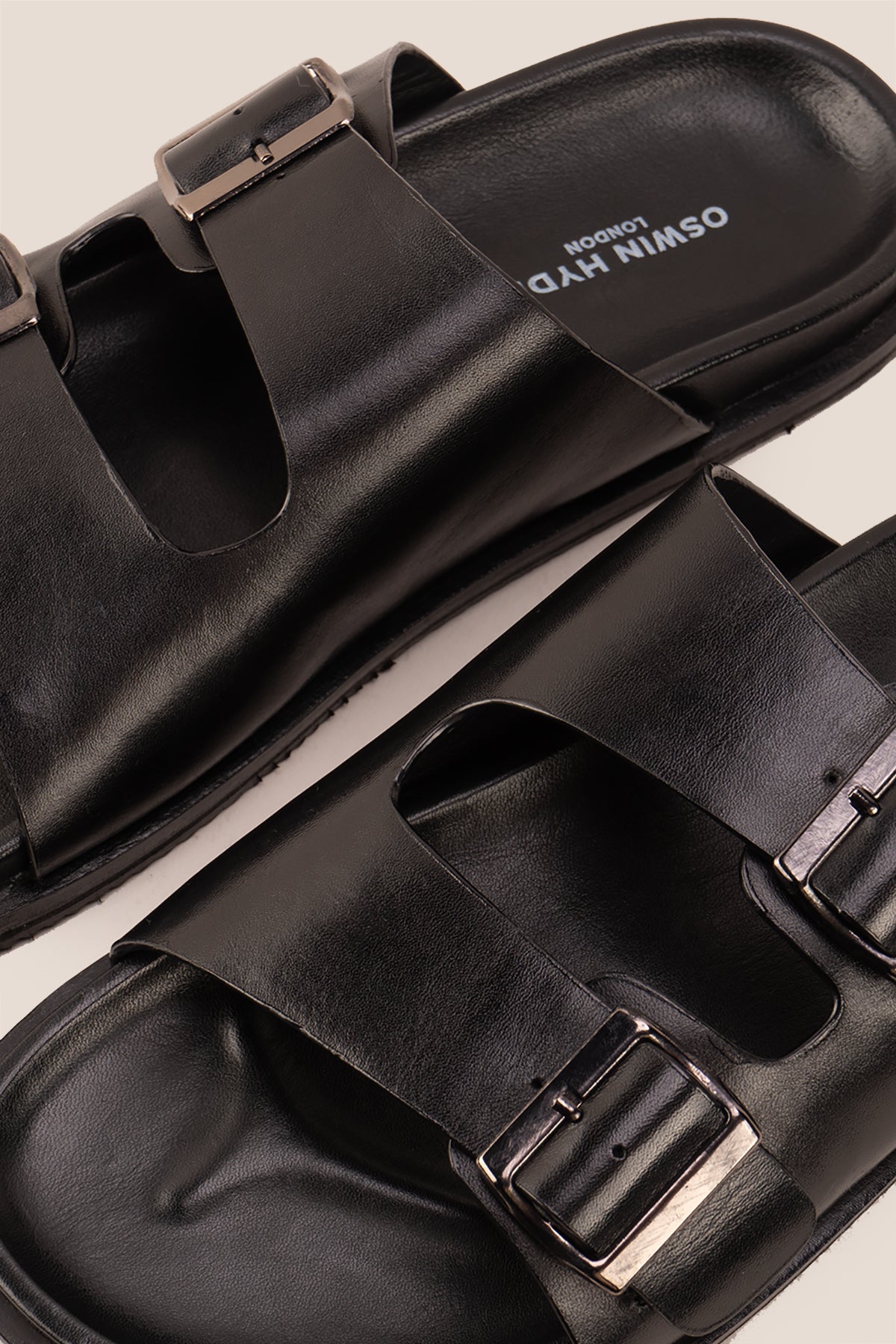 Jude Black leather men's sandals with twin buckle straps and high-quality leather design, ideal for everyday comfort and casual summer wear.