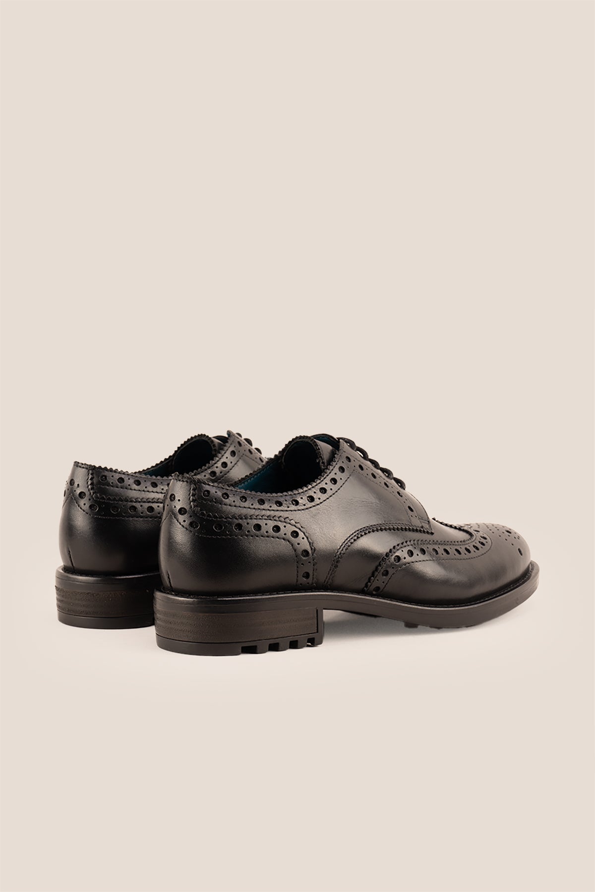 George black leather brogue shoes for men with five-eyelet wing cap design, combining classic craftsmanship and formal elegance.