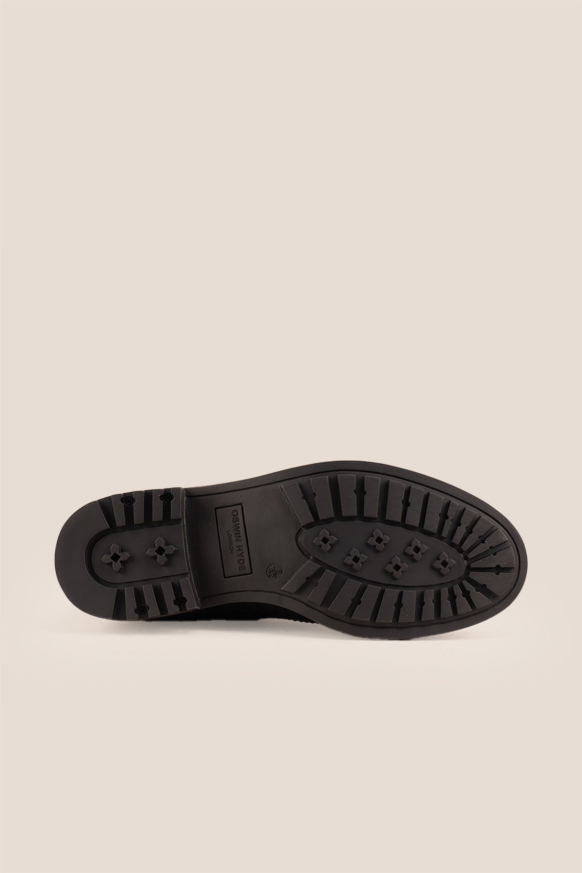 Gavin black leather Chelsea boots for men with intricate brogue detailing, showcasing timeless elegance and refined craftsmanship