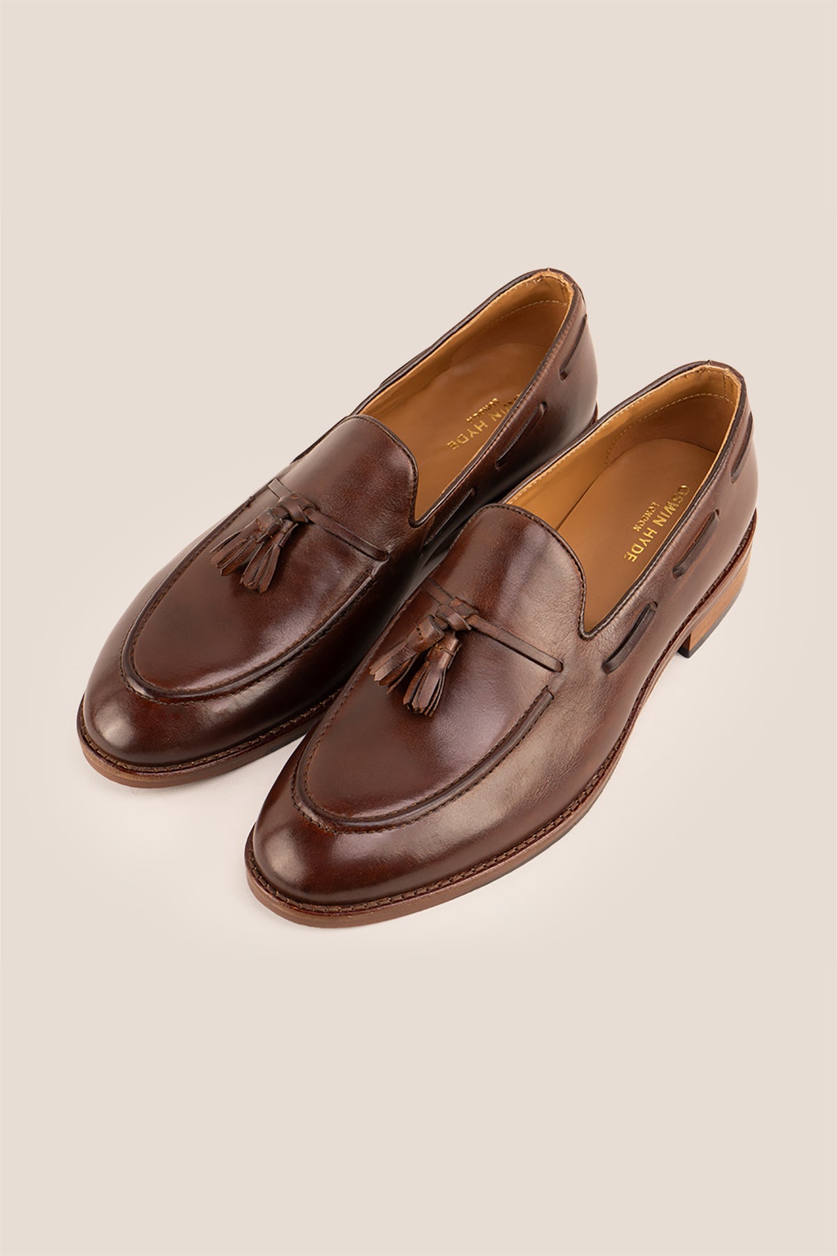 Issac Brown leather tassel loafers for men with comfort sole, stylish and supportive, perfect for modern smart-casual looks.