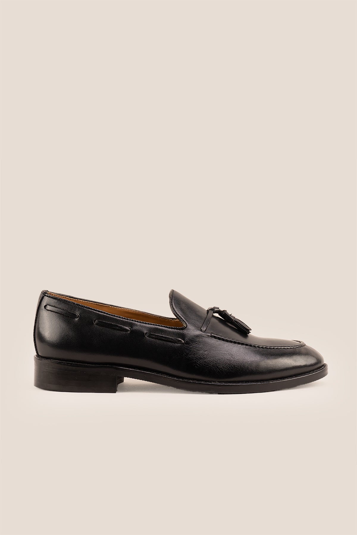Issac Black Leather Tassel Loafers for men with cushioned sole, premium finish, and timeless style—ideal for formal wear and smart-casual outfits.