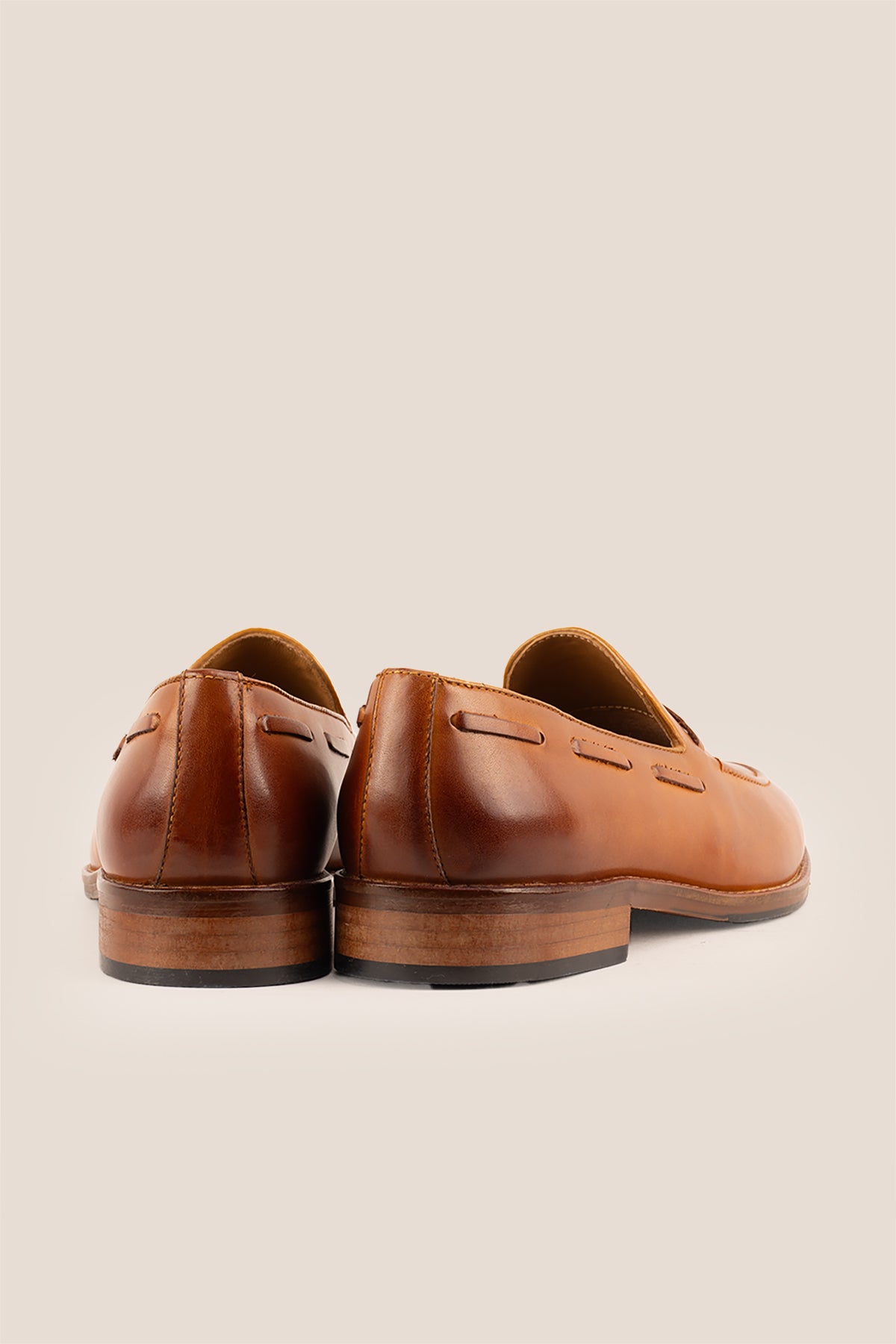 Issac Tan leather tassel loafers for men, featuring premium leather and comfort sole for all-day wear, ideal for smart-casual and formal occasions.