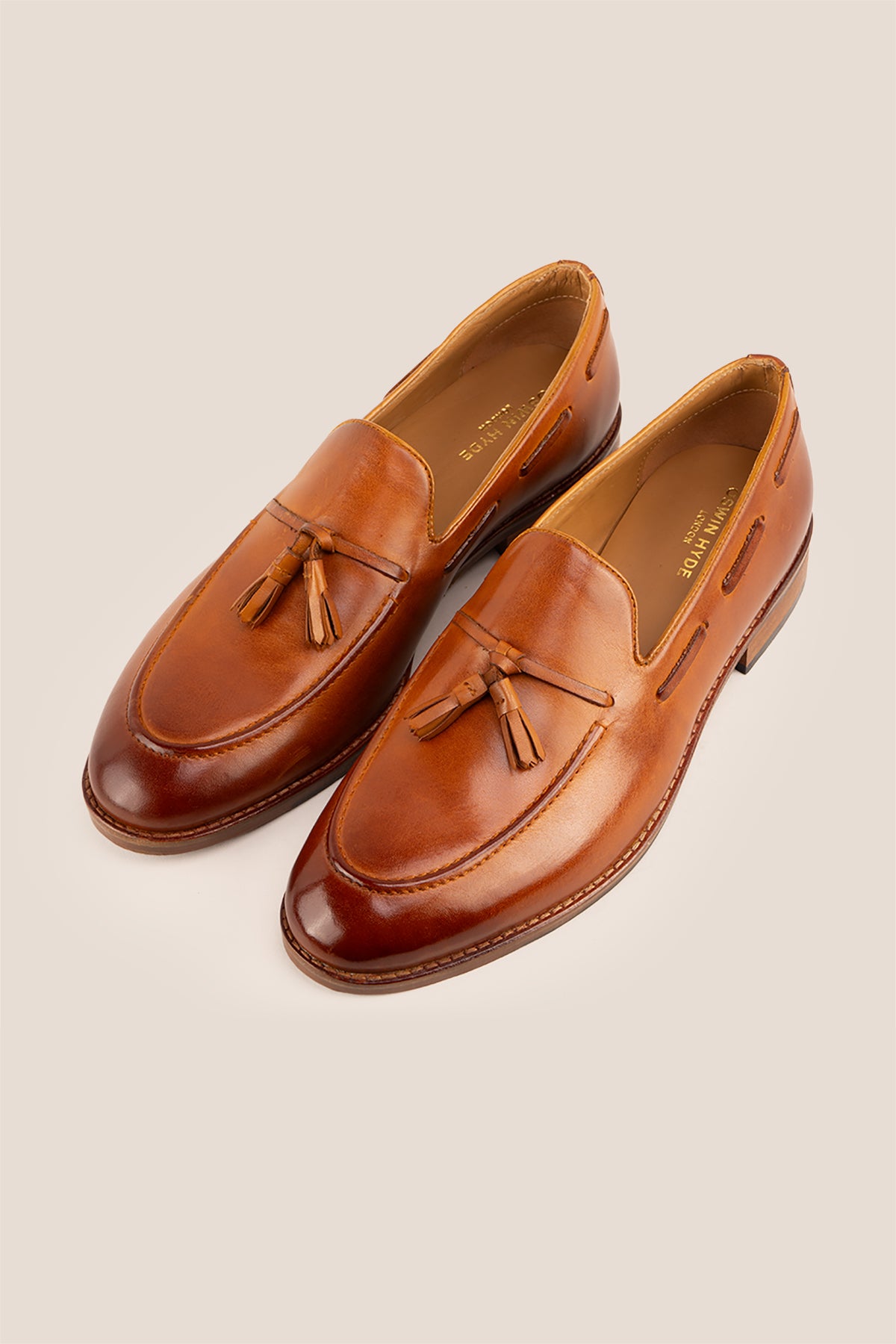 Issac Tan leather tassel loafers for men, featuring premium leather and comfort sole for all-day wear, ideal for smart-casual and formal occasions.