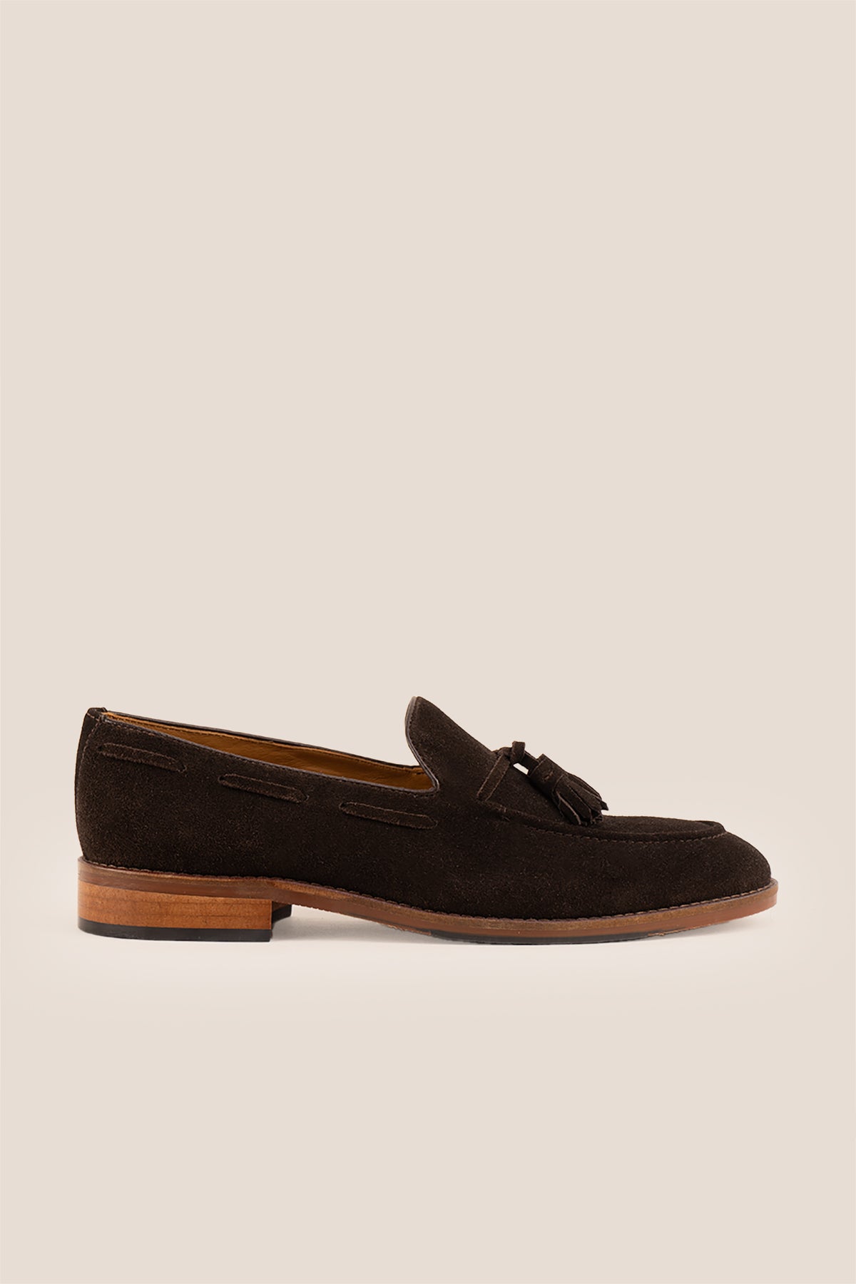 Brown suede tassel loafers for men with comfort sole, combining premium suede craftsmanship and modern elegance for stylish everyday wear.
