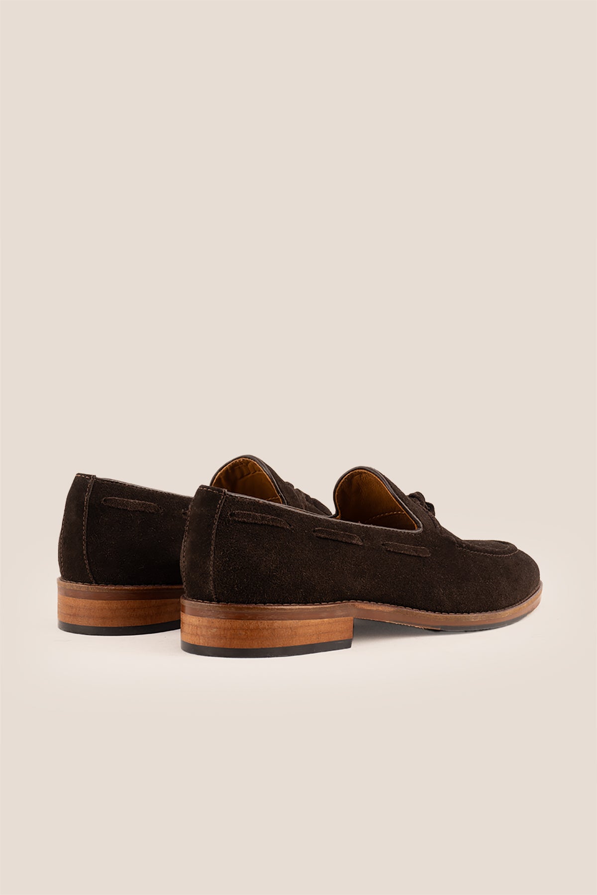 Brown suede tassel loafers for men with comfort sole, combining premium suede craftsmanship and modern elegance for stylish everyday wear.