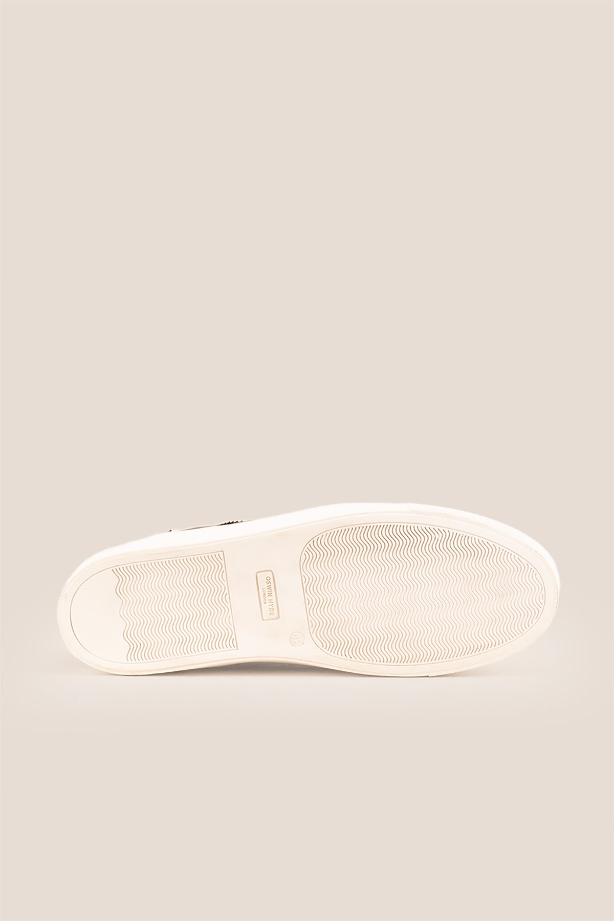 Stan Black wingtip brogue trainer shoes for men, crafted from premium leather with classic wingtip detailing and modern trainer sole.