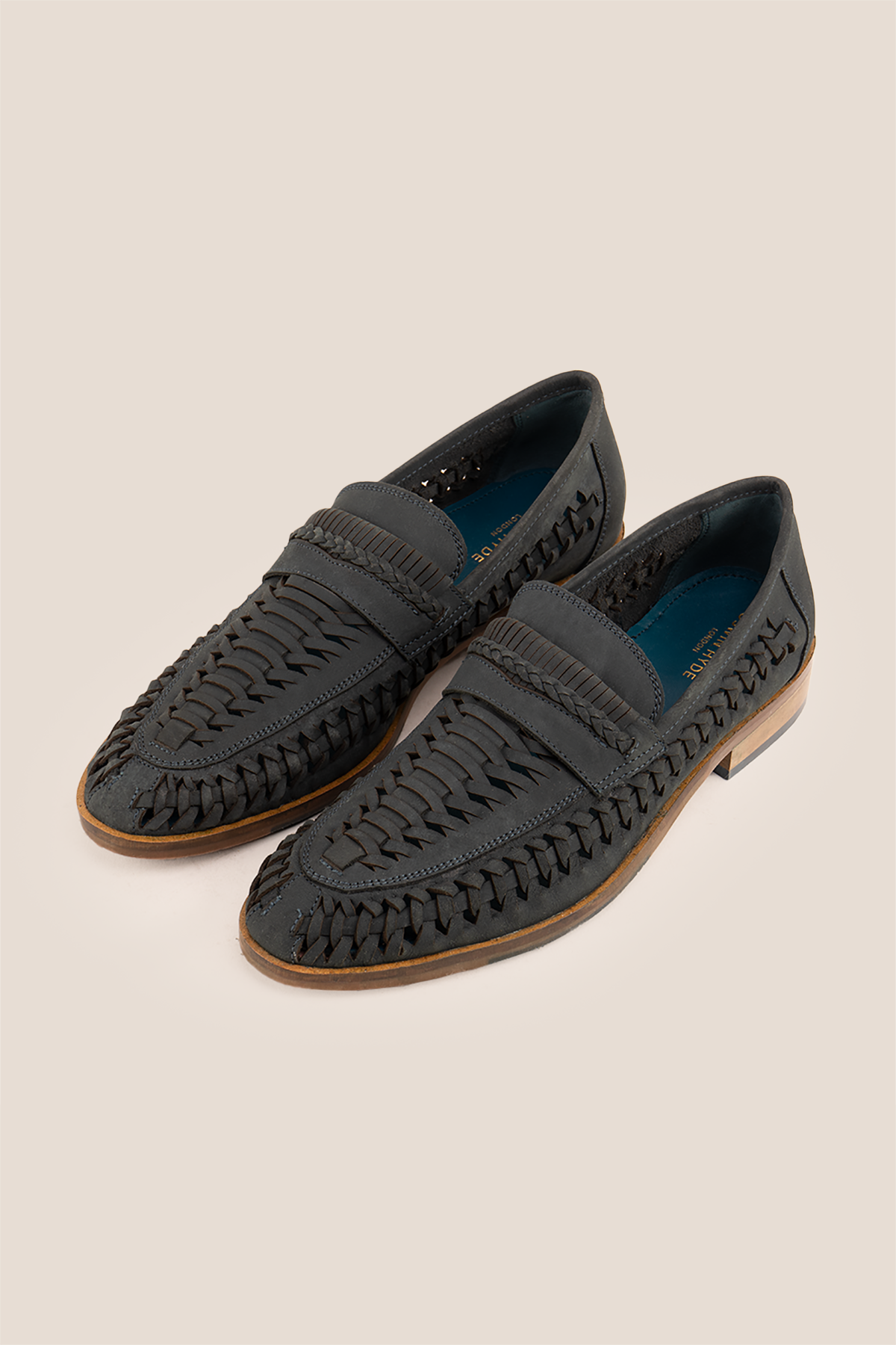 Finley navy woven leather loafers for men, featuring premium craftsmanship, intricate weave detail, and a refined, durable finish