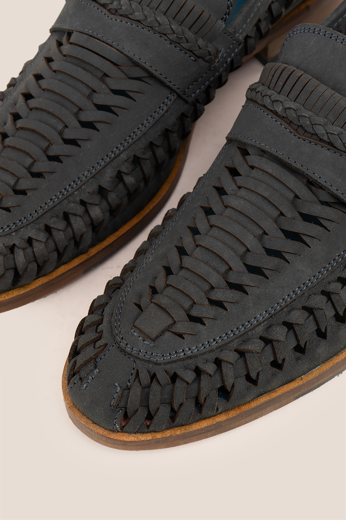 Finley navy woven leather loafers for men, featuring premium craftsmanship, intricate weave detail, and a refined, durable finish