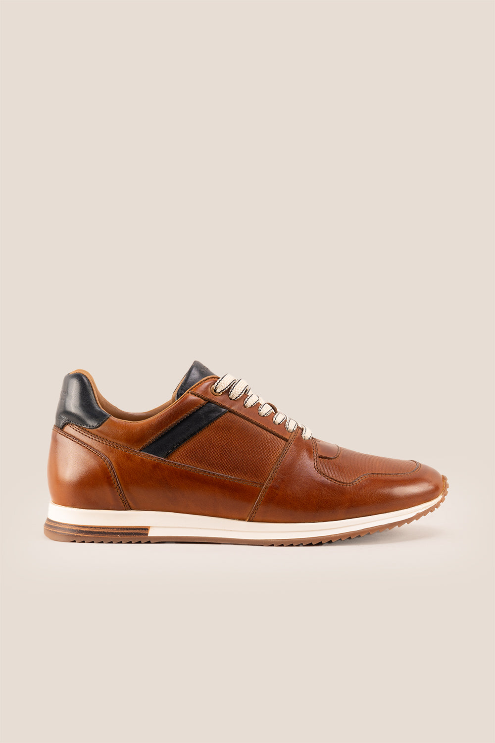 Rory Tan leather sneakers for men, featuring a classic design that exudes timeless elegance