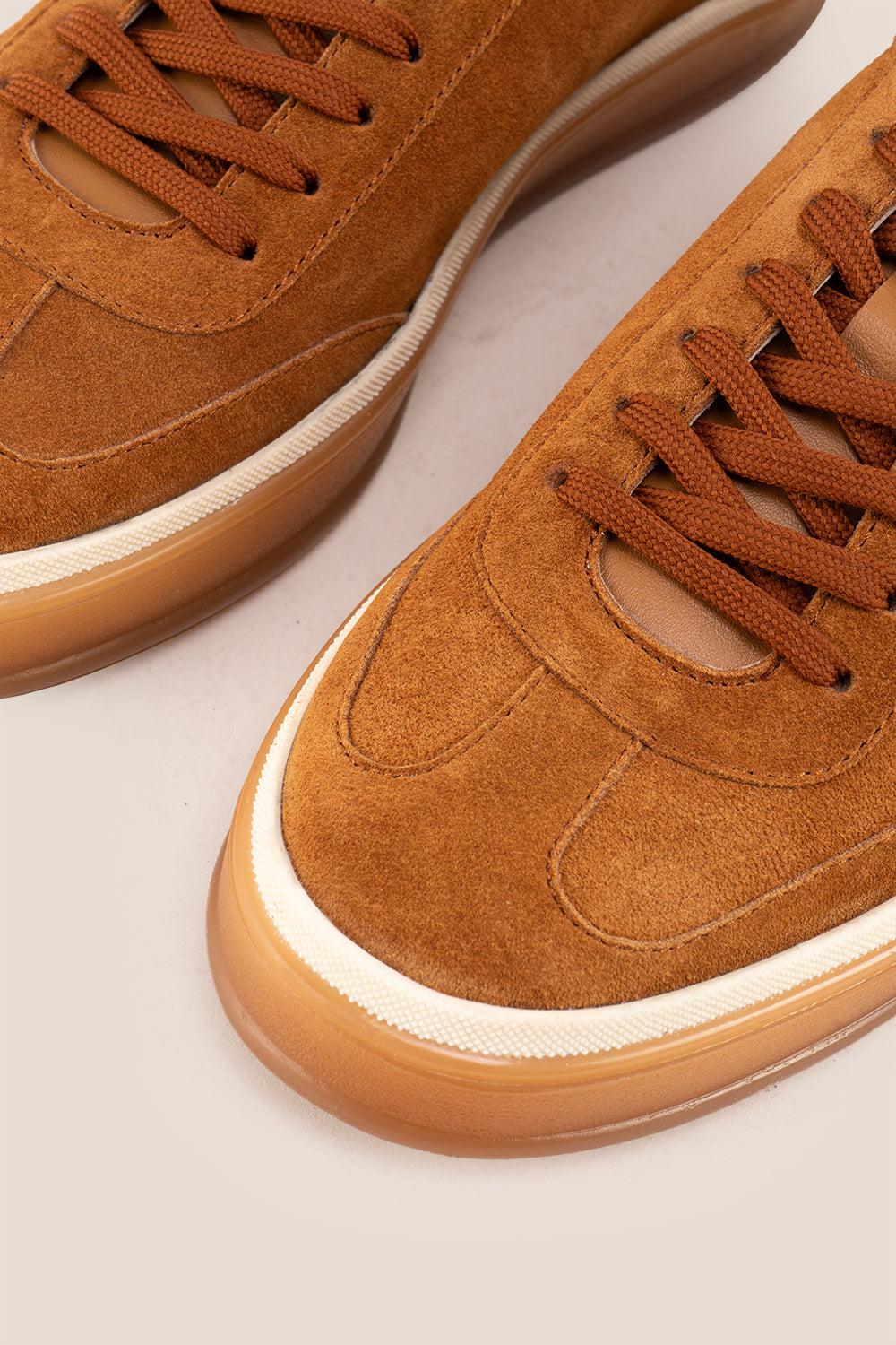 Smith tan suede men's sneakers with sleek seven-eyelet design, crafted from premium suede for modern style, comfort, and durability