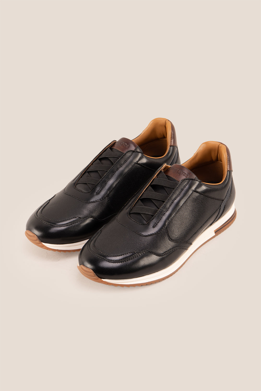 Colt black men's leather sneakers with elastic detailing for a secure, comfortable fit and sleek, modern style