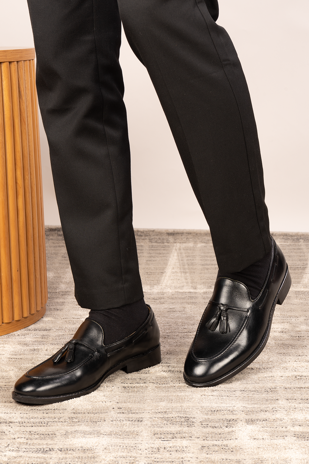 Issac Black Leather Tassel Loafers for men with cushioned sole, premium finish, and timeless style—ideal for formal wear and smart-casual outfits.