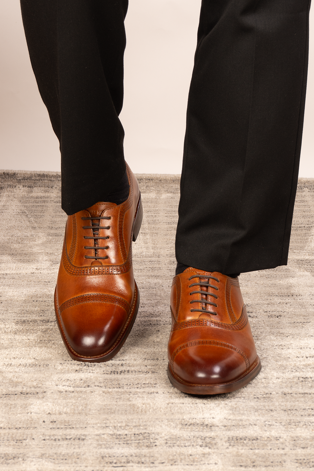 Creed tan men's leather shoes with timeless five-eyelet toecap brogue design, crafted in premium leather for a refined, sophisticated look