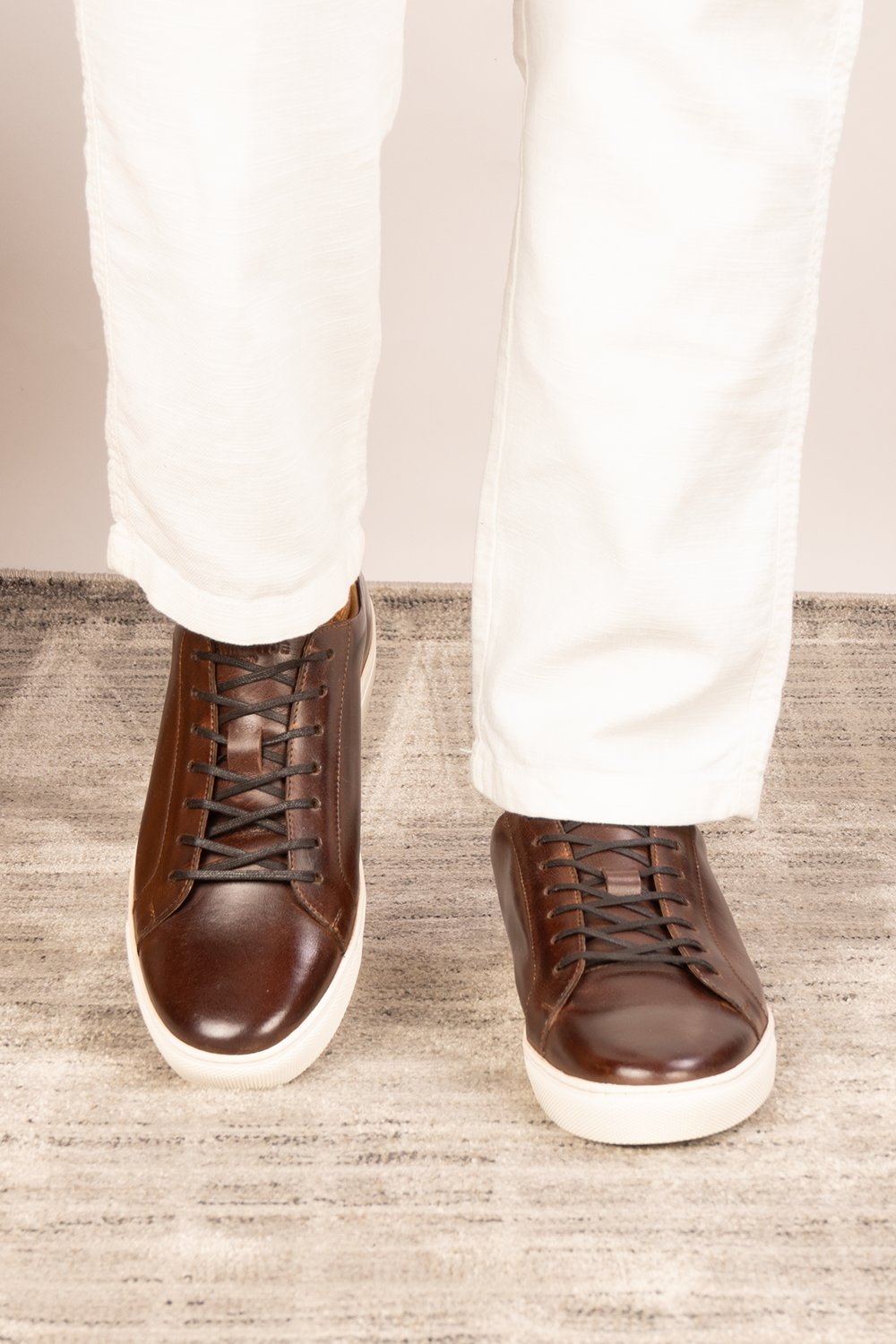 Harper brown leather classic trainers for men featuring durable leather upper and comfortable sole, ideal for casual and smart-casual wear.