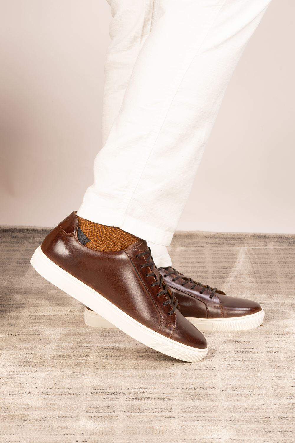 Harper brown leather classic trainers for men featuring durable leather upper and comfortable sole, ideal for casual and smart-casual wear.