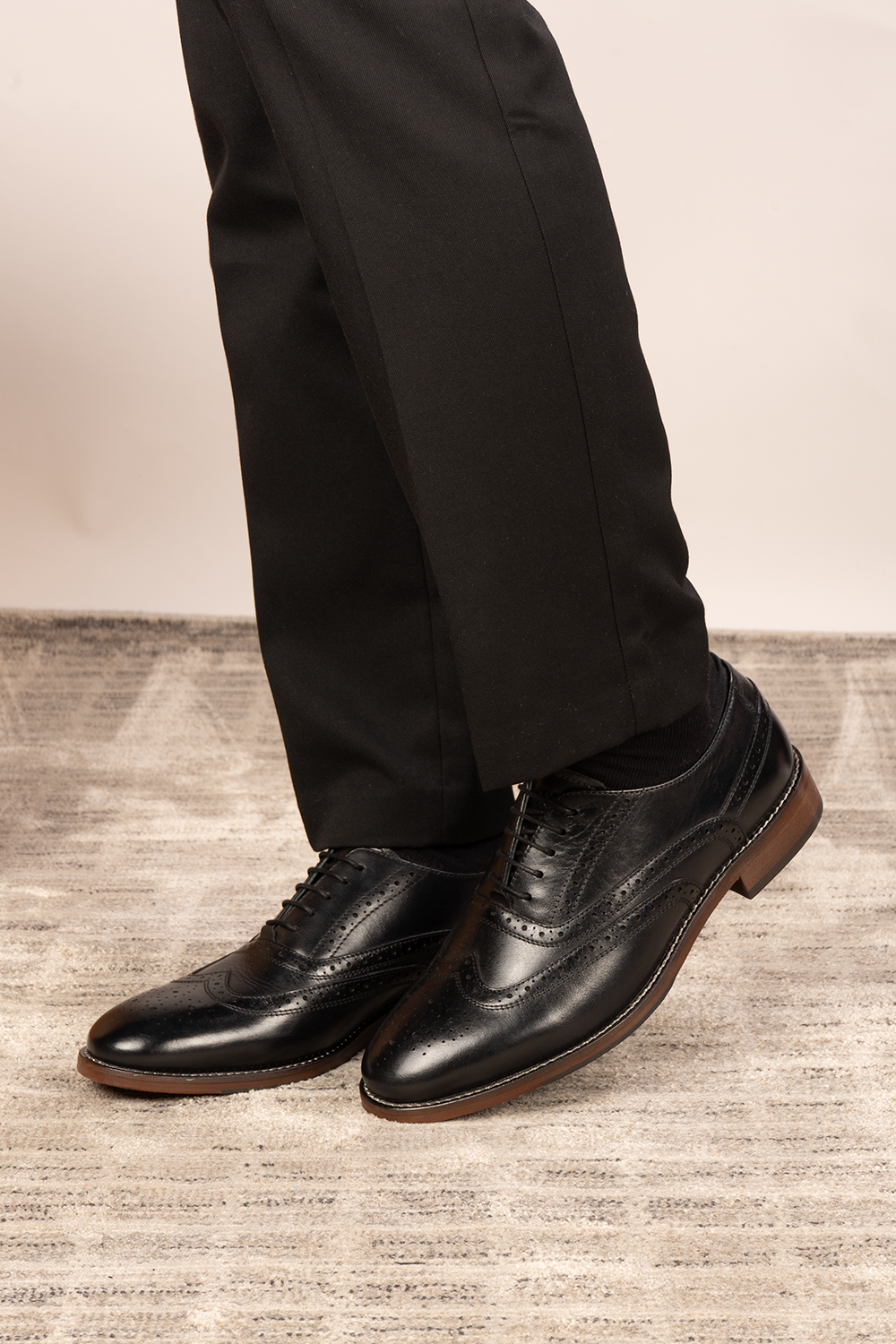 Winston wide fit black leather brogue shoes for men featuring classic punched detailing and premium finish.