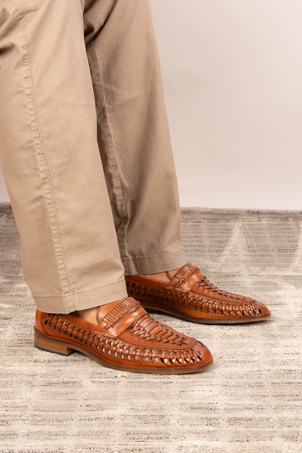 Finley tan woven leather loafer for men, showcasing premium craftsmanship with a sophisticated and timeless design