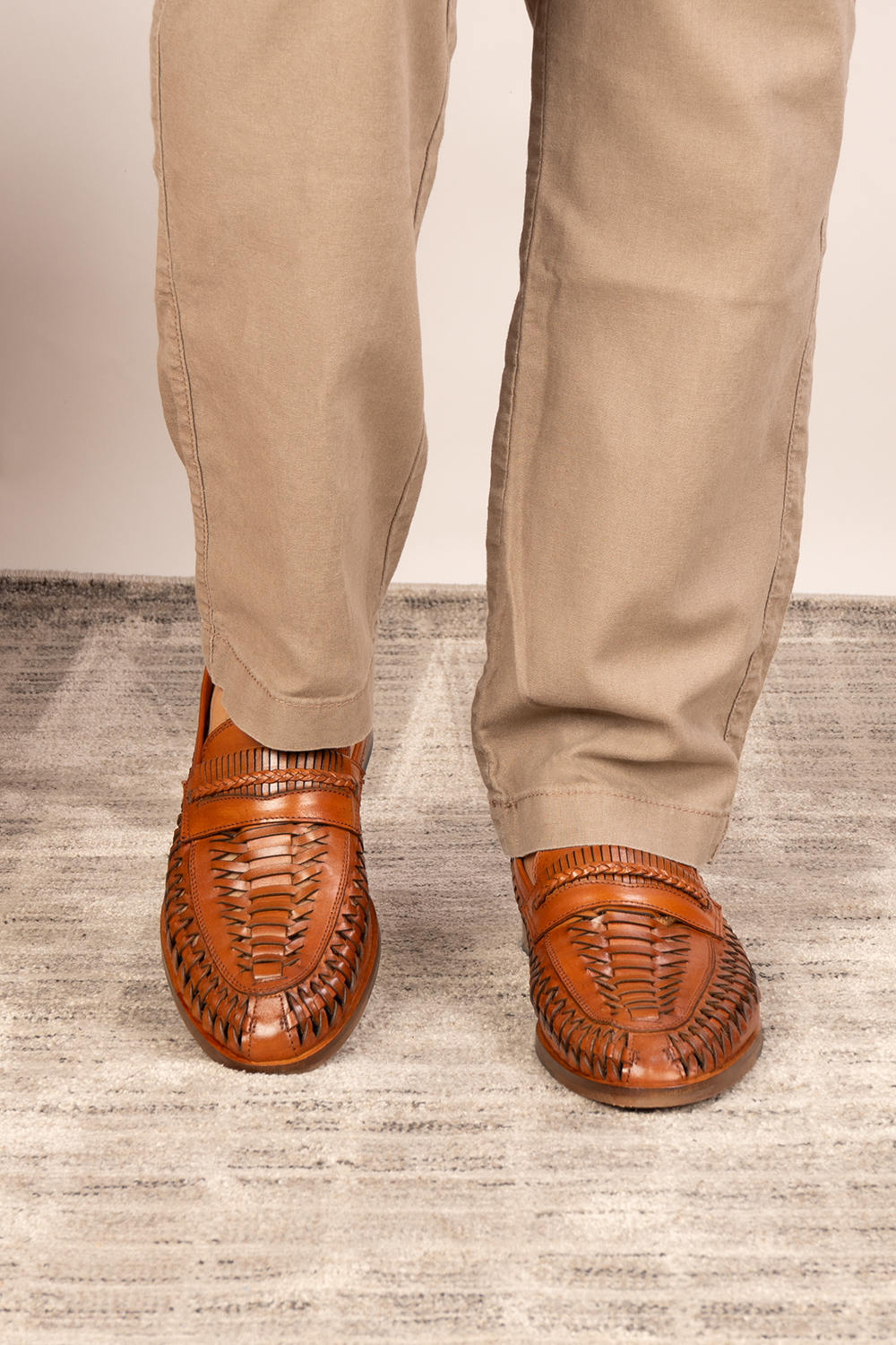 Finley tan woven leather loafer for men, showcasing premium craftsmanship with a sophisticated and timeless design