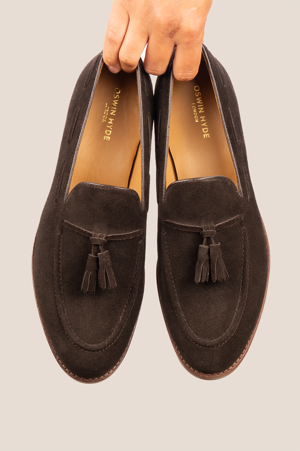 Brown suede tassel loafers for men with comfort sole, combining premium suede craftsmanship and modern elegance for stylish everyday wear.