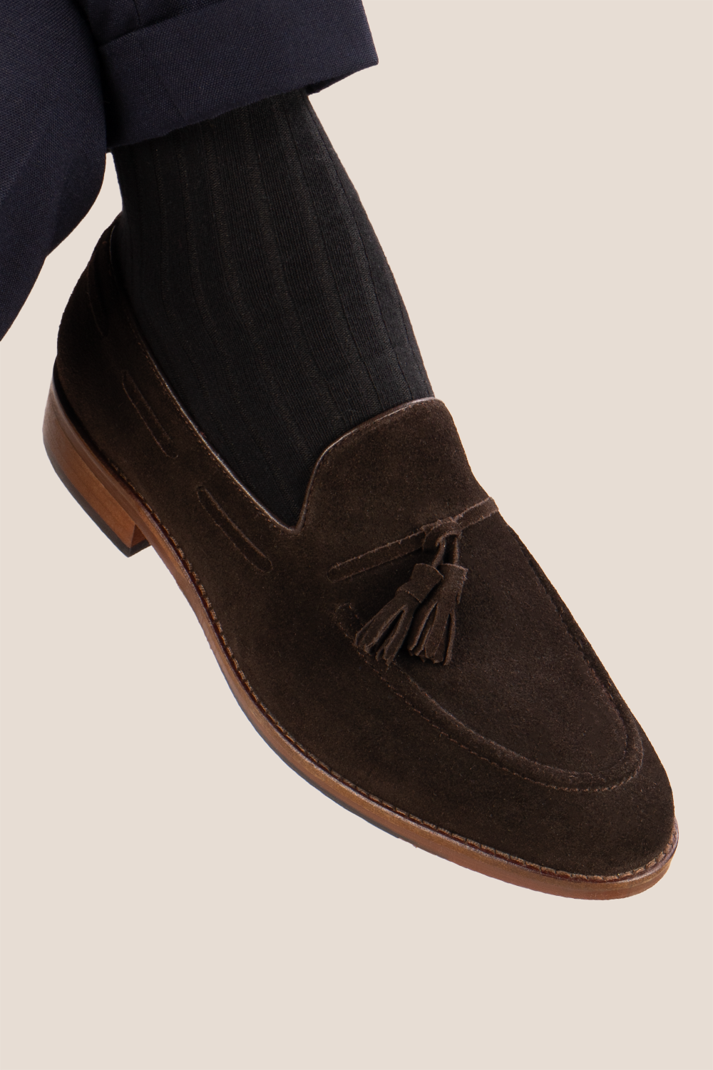 Brown suede tassel loafers for men with comfort sole, combining premium suede craftsmanship and modern elegance for stylish everyday wear.