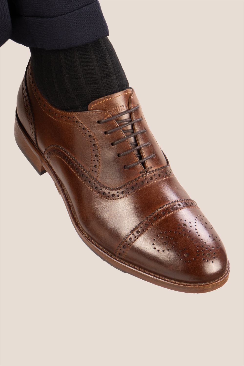 Westminster brown leather Oxford brogue shoes for men, featuring a five-eyelet lace-up and classic toecap detail for a polished formal look.