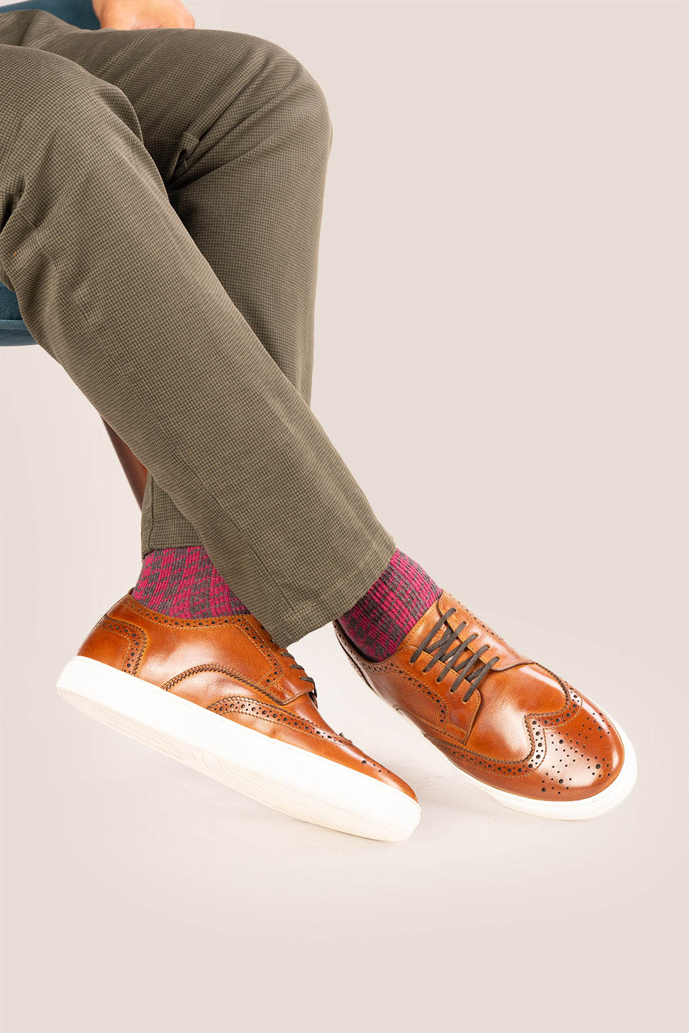 Men’s Stan cognac leather wingtip brogues featuring traditional perforated detailing, breathable lining and a durable leather sole.