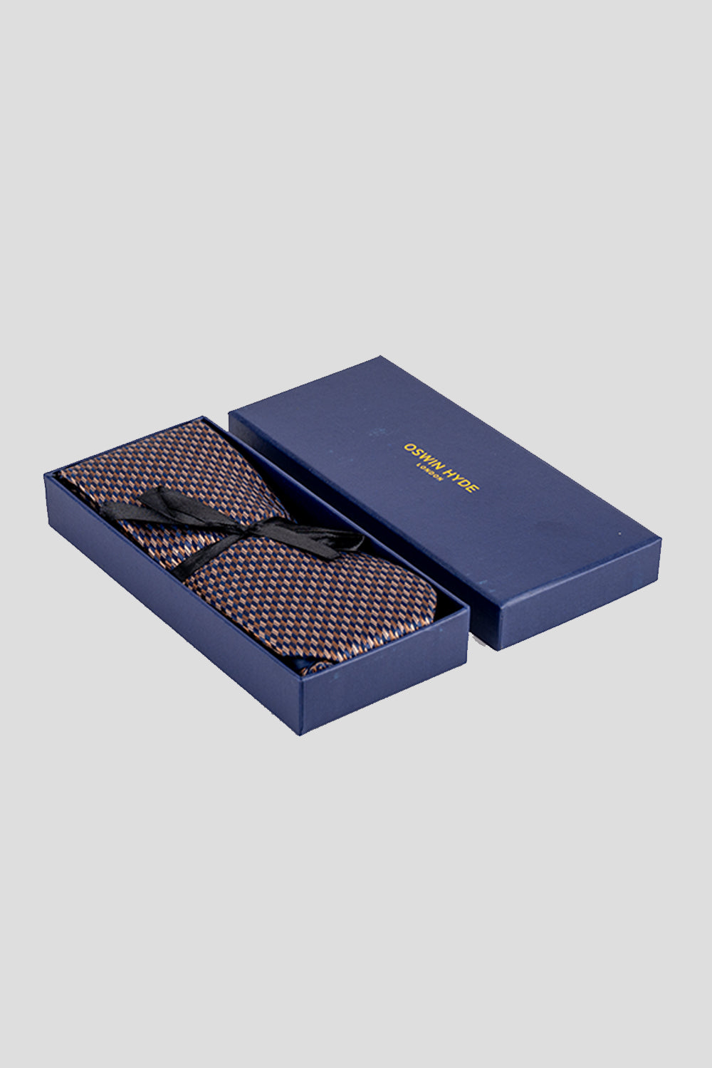 Luke Bronze/Navy tie with geometric pattern, perfect for weddings and special occasions.
