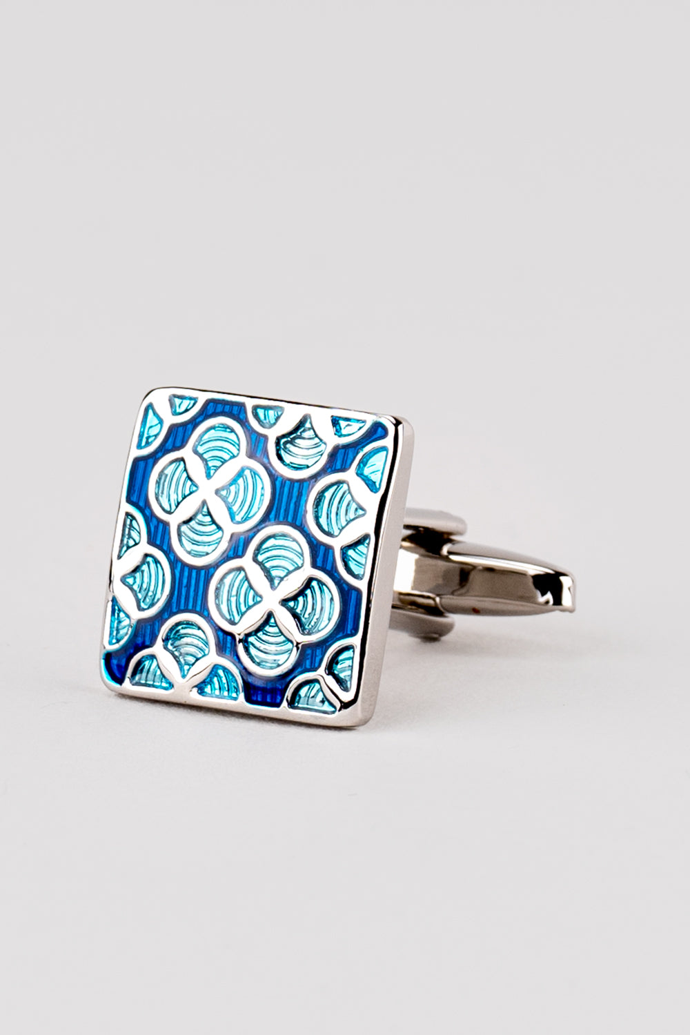 Leon Black men’s cufflinks with a blue geometric design set in polished metal, crafted for luxury precision and formal elegance.