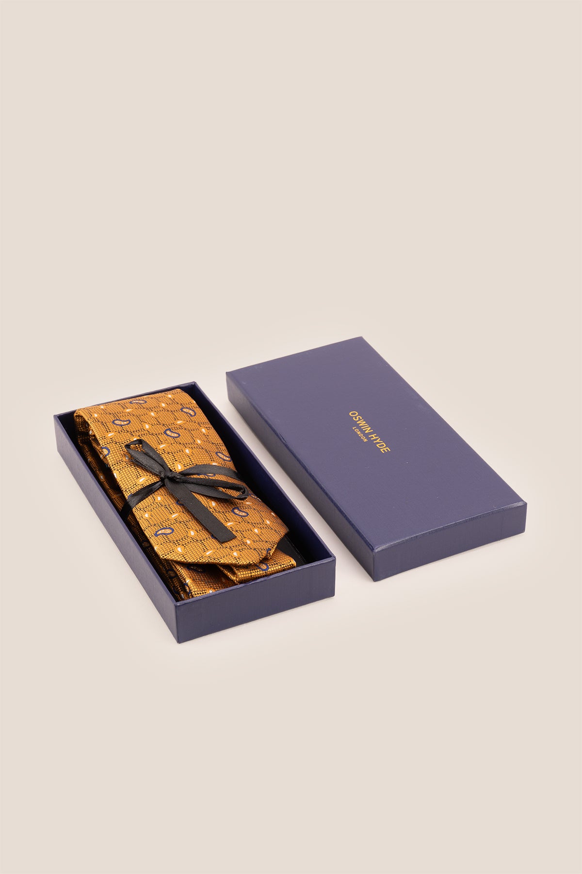 Oswin Hyde Paisley Geometric Copper for men, designed to add a unique flair to your wardrobe. The intricate paisley and geometric patterns, combined with the rich copper colour.