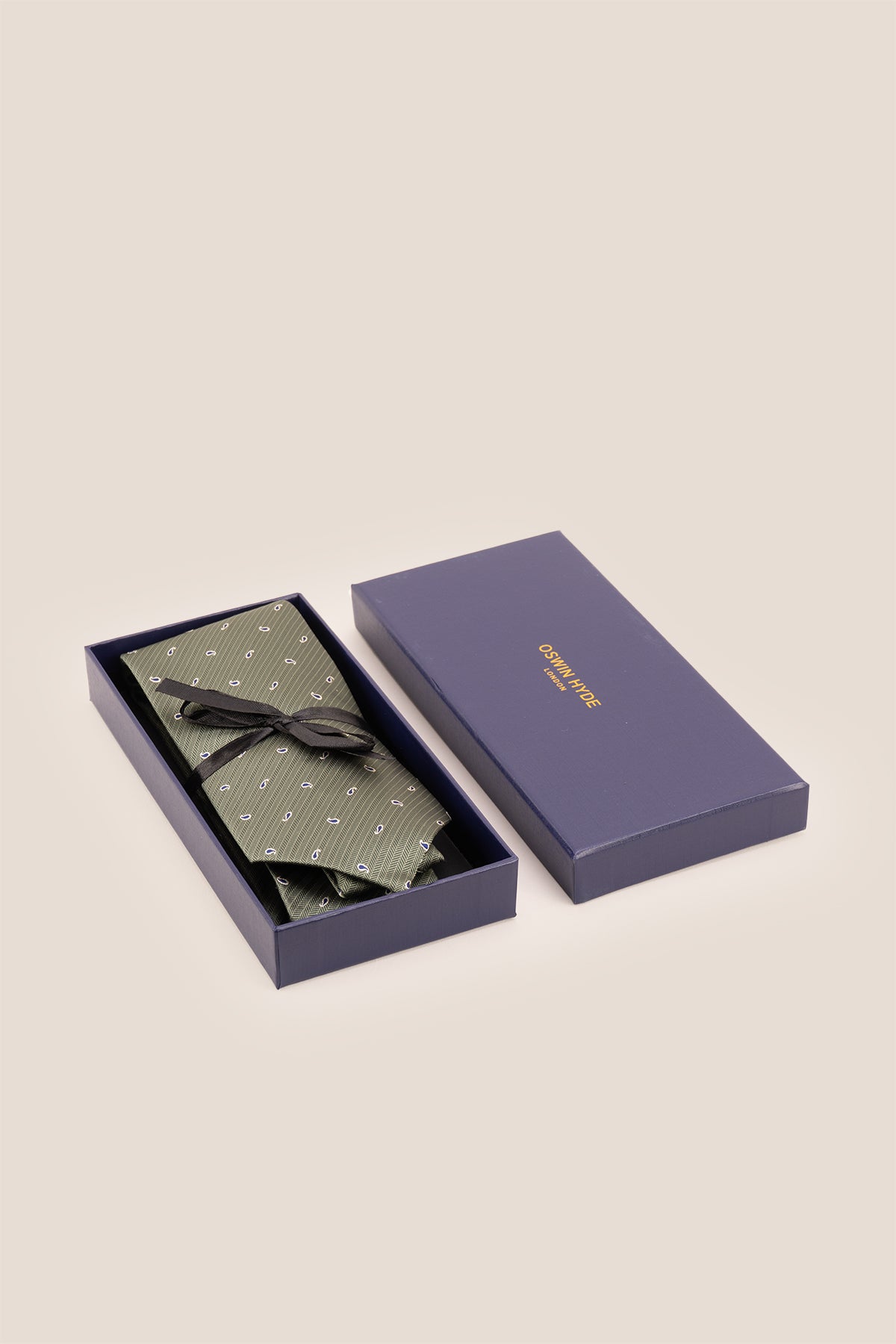 Oswin Hyde Green Micro Paisley ties for men. Featuring a subtle paisley pattern in a rich green hue, made from high-quality material.