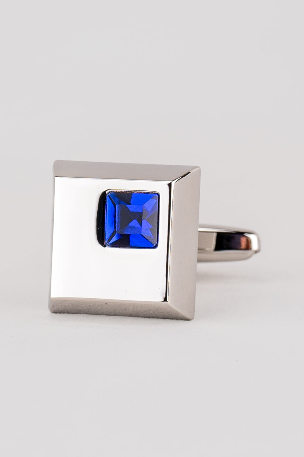 Henry Silver men’s cufflinks with blue crystal accents in detailed silver metalwork for refined formal elegance.