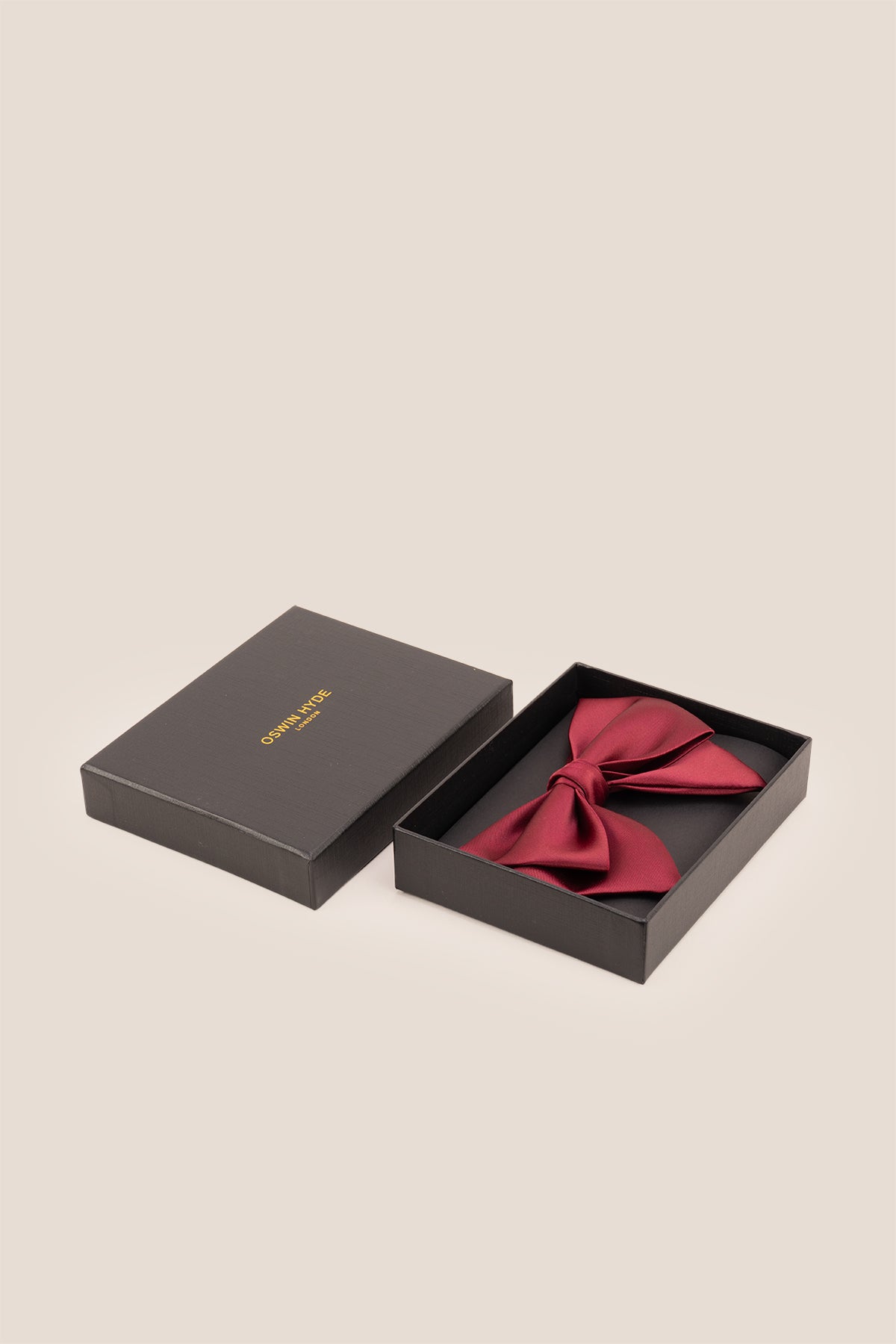 Red Retro Bow Tie made from high-quality satin, featuring a rich texture and vibrant red colour that blends classic retro charm with modern elegance-ideal for weddings and formal events.