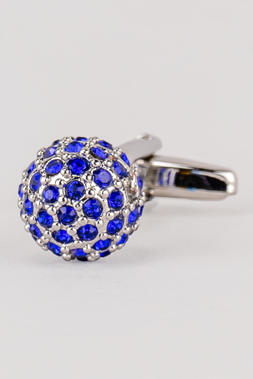 Sphere blue men’s cufflinks with sparkling blue rhinestones set in silver-tone metal, crafted in a polished spherical design.