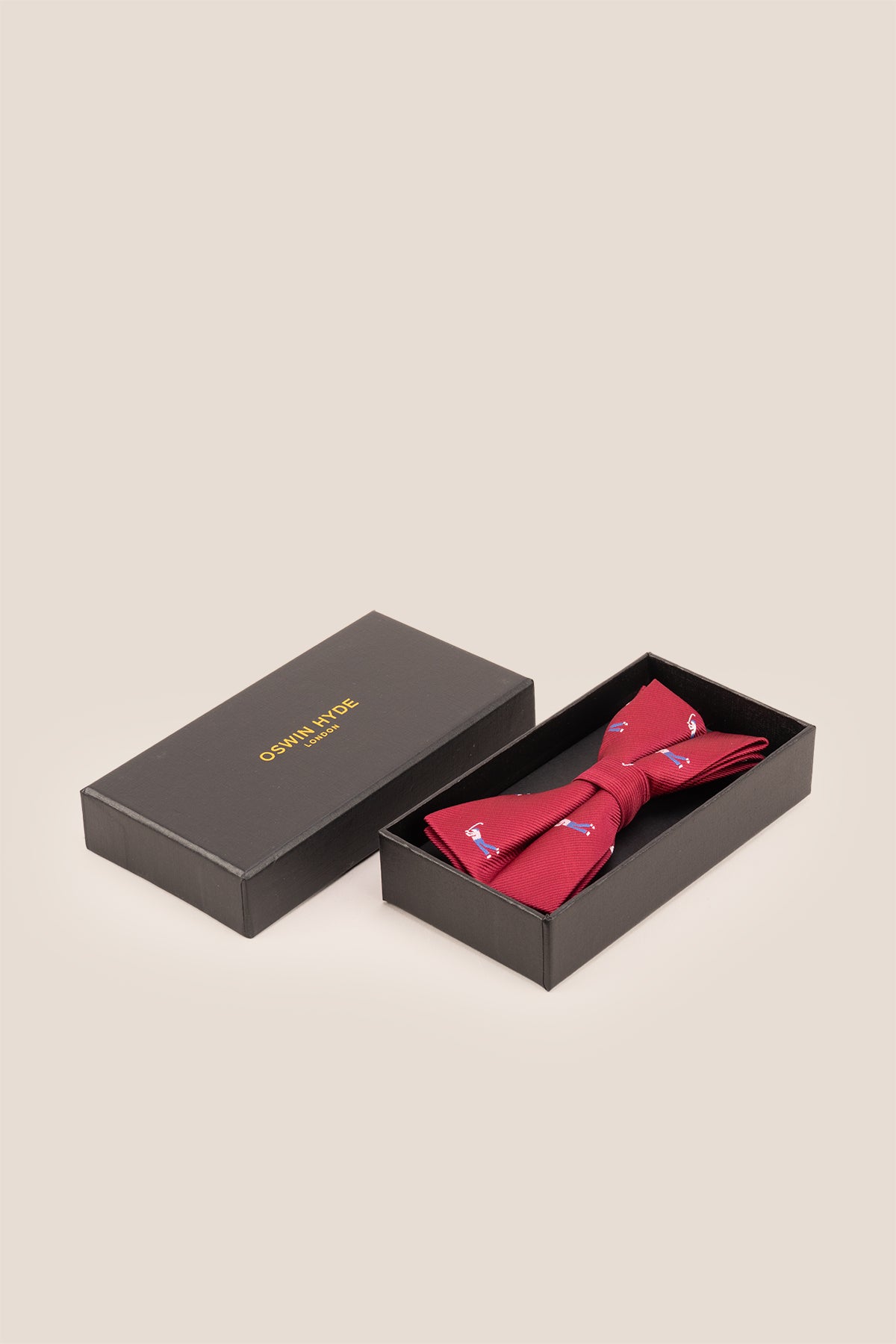 Red Golf Bowtie, designed for men who want to add a lively splash of colour to their wardrobe, made from high quality materials.
