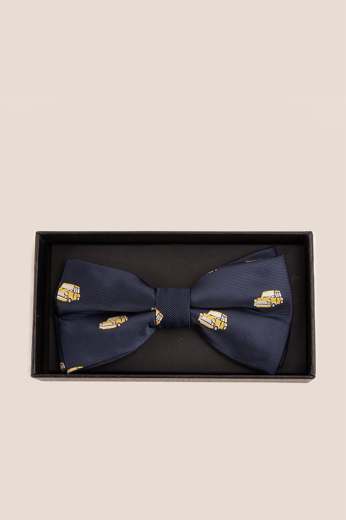 Navy Mini Bow Tie for men featuring a rich navy colour with subtle embroidered detailing, crafted for those who appreciate classic elegance and timeless formal style.