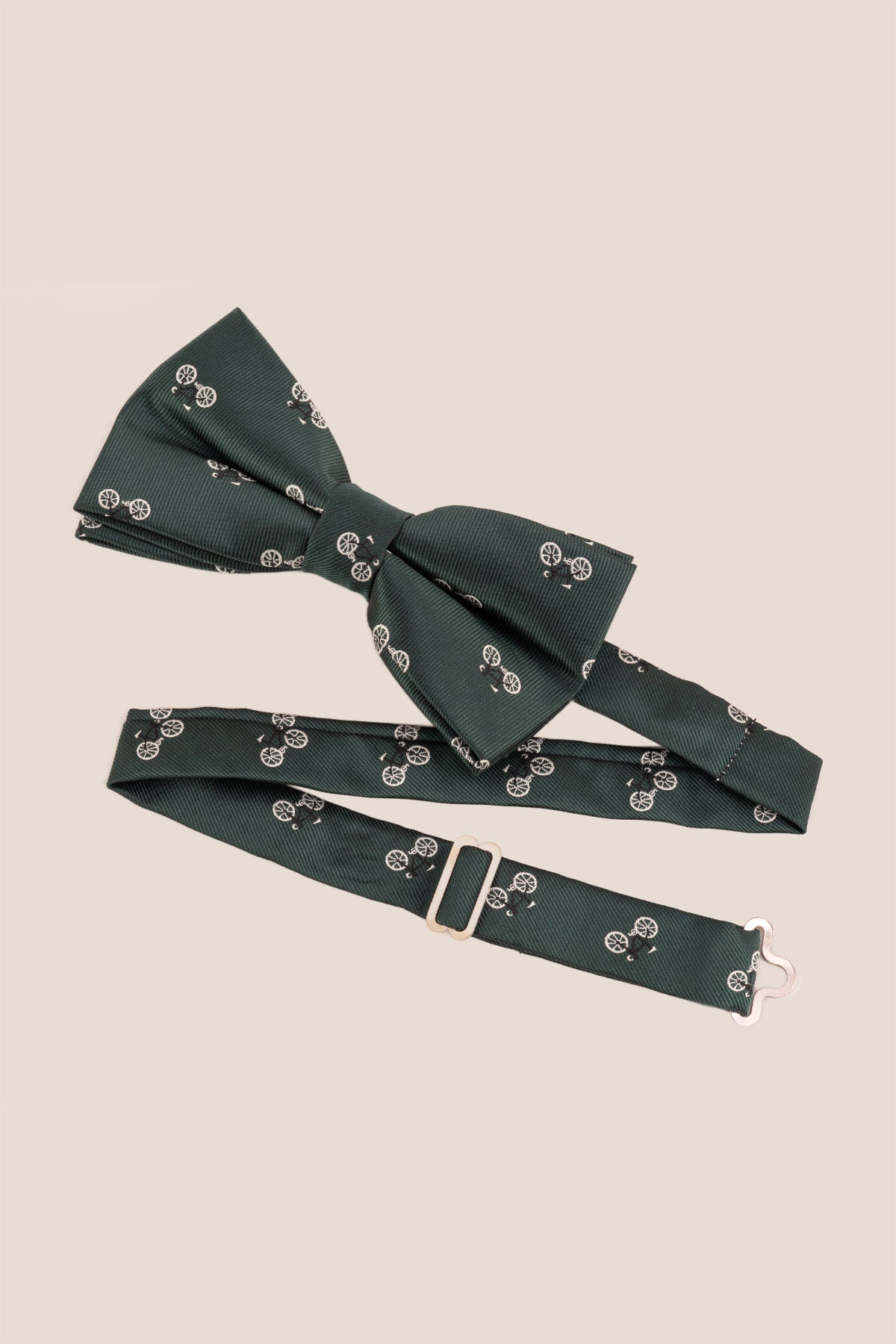 Green Cycle Bow Tie featuring a vibrant green shade with a playful cycling-inspired pattern, adding a touch of character and charm to any formal or casual outfit.