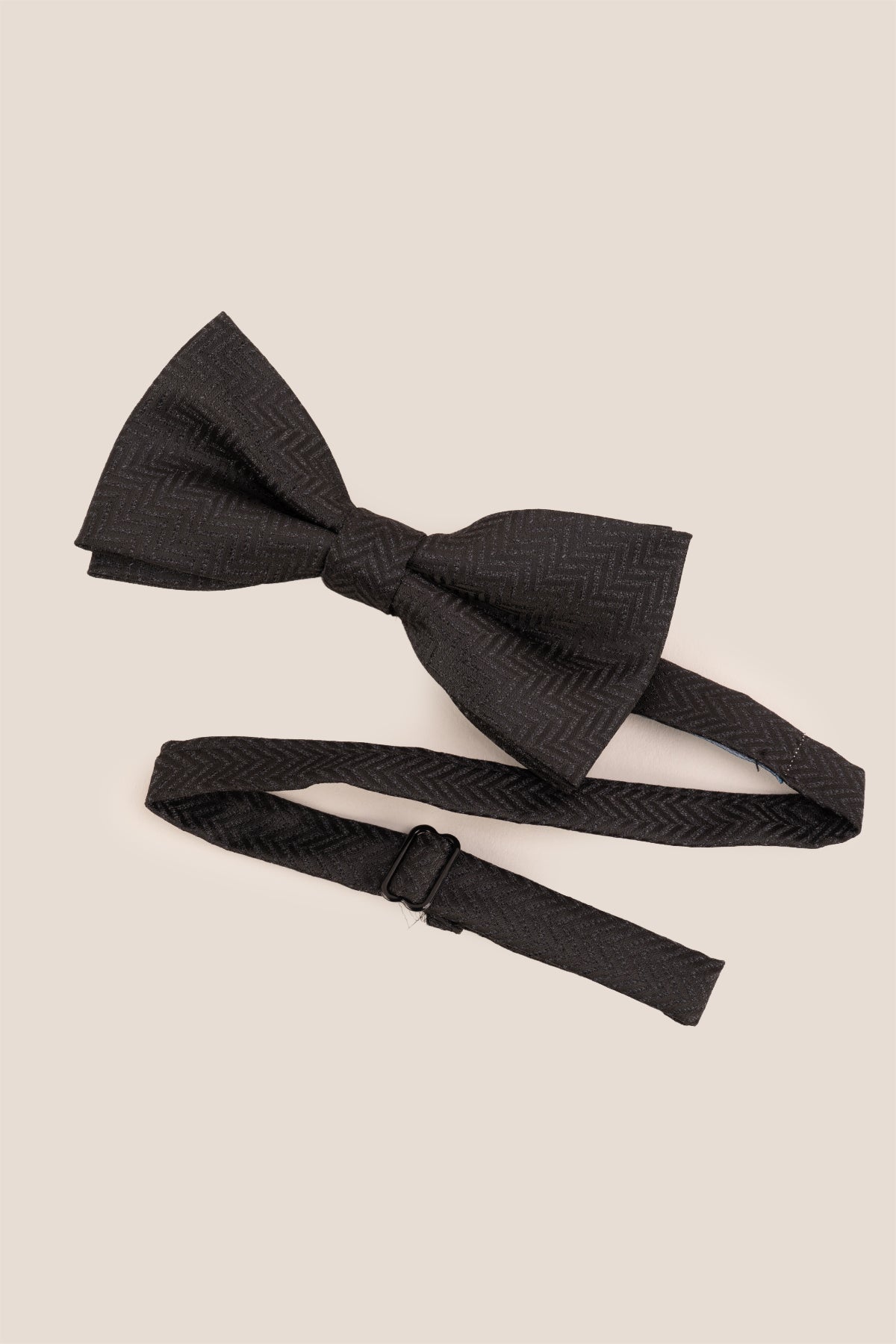 Oswin Hyde Herringbone Black Bowtie, featuring a classic herringbone pattern. deep black colour and textured fabric with an intricate design