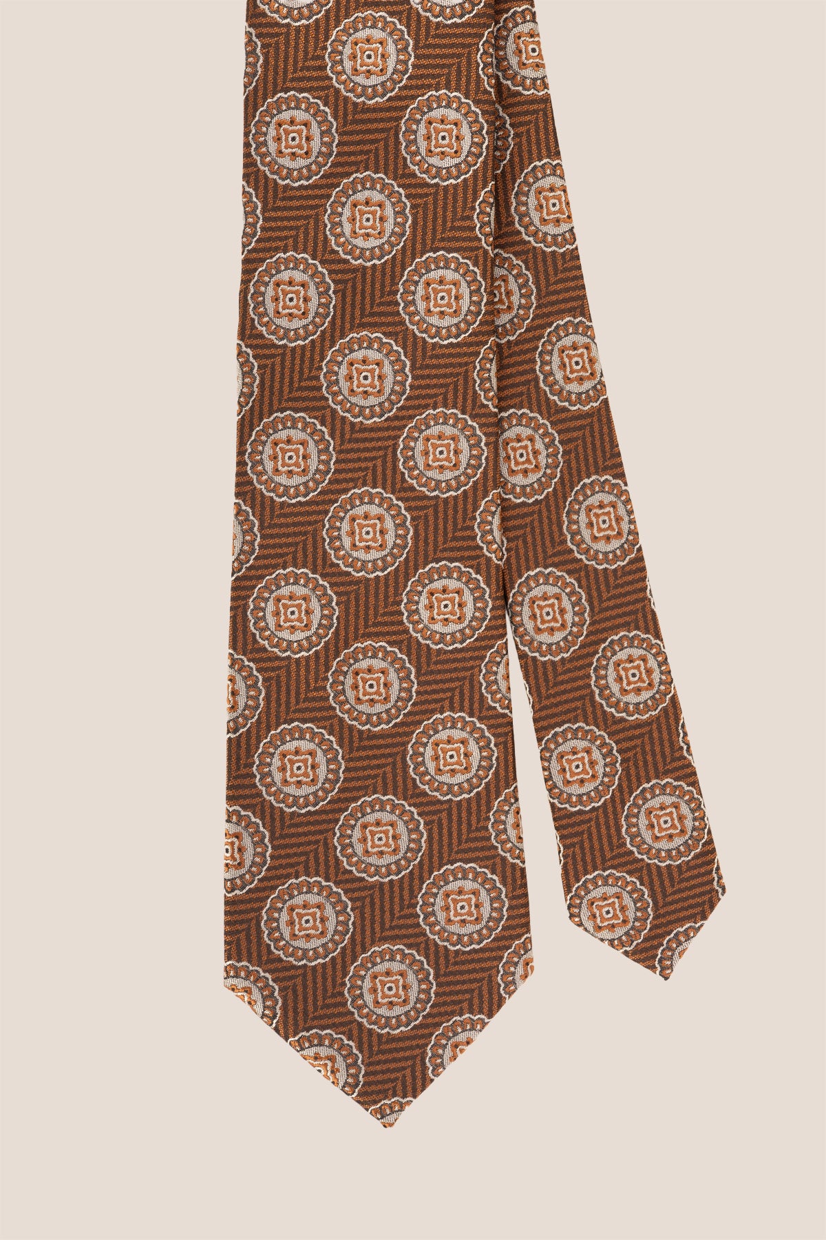 Brown Geometric Circles tie for men. Featuring a striking geometric circle pattern in rich brown