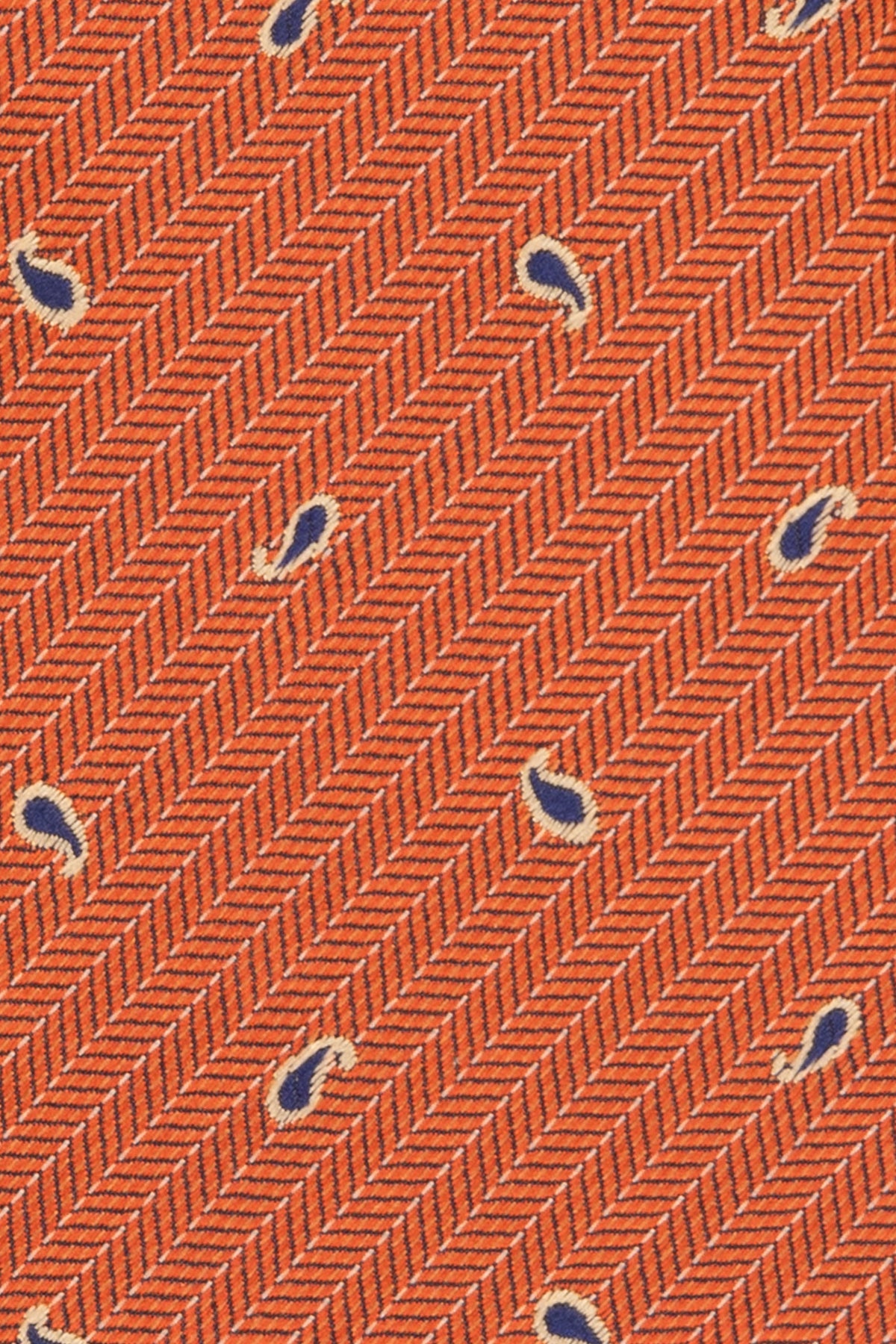 Oswin Hyde Copper Micro Paisley ties for men. The rich copper hue, combined with intricate paisley patterns, crafted from high-quality material