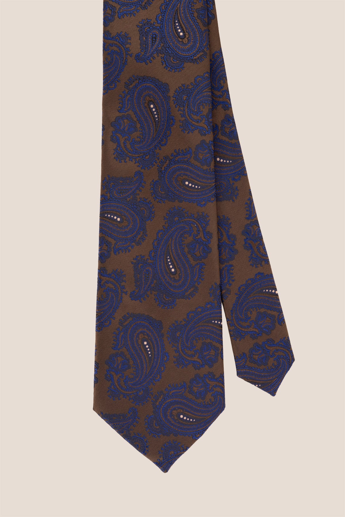 Oswin Hyde Brown Navy Paisley ties for men. The rich blend of brown and navy hues, paired with intricate paisley patterns.