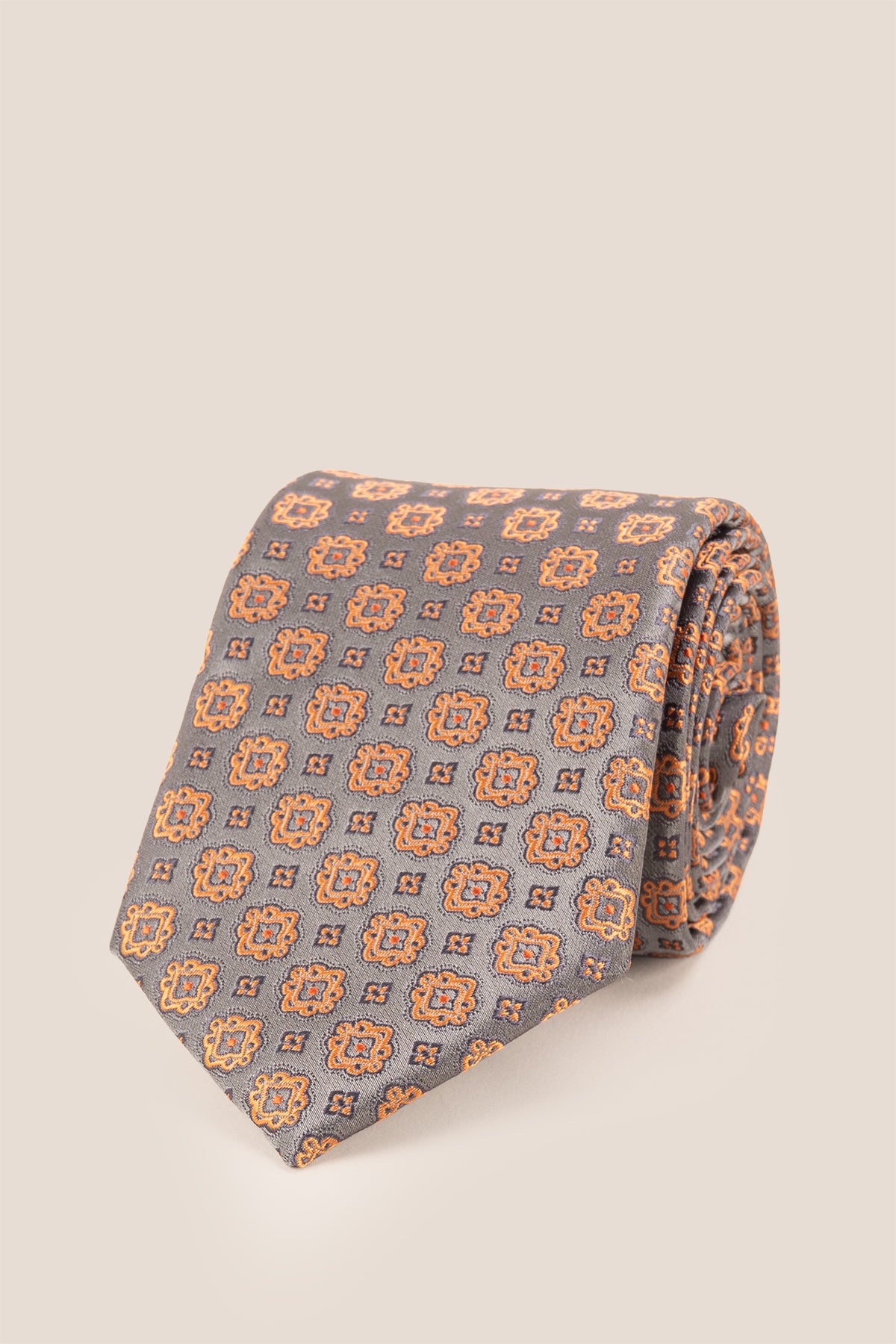 Grey Geometric Circles tie, crafted to bring a modern edge to your outfit. Its distinctive geometric circle design in muted grey shades