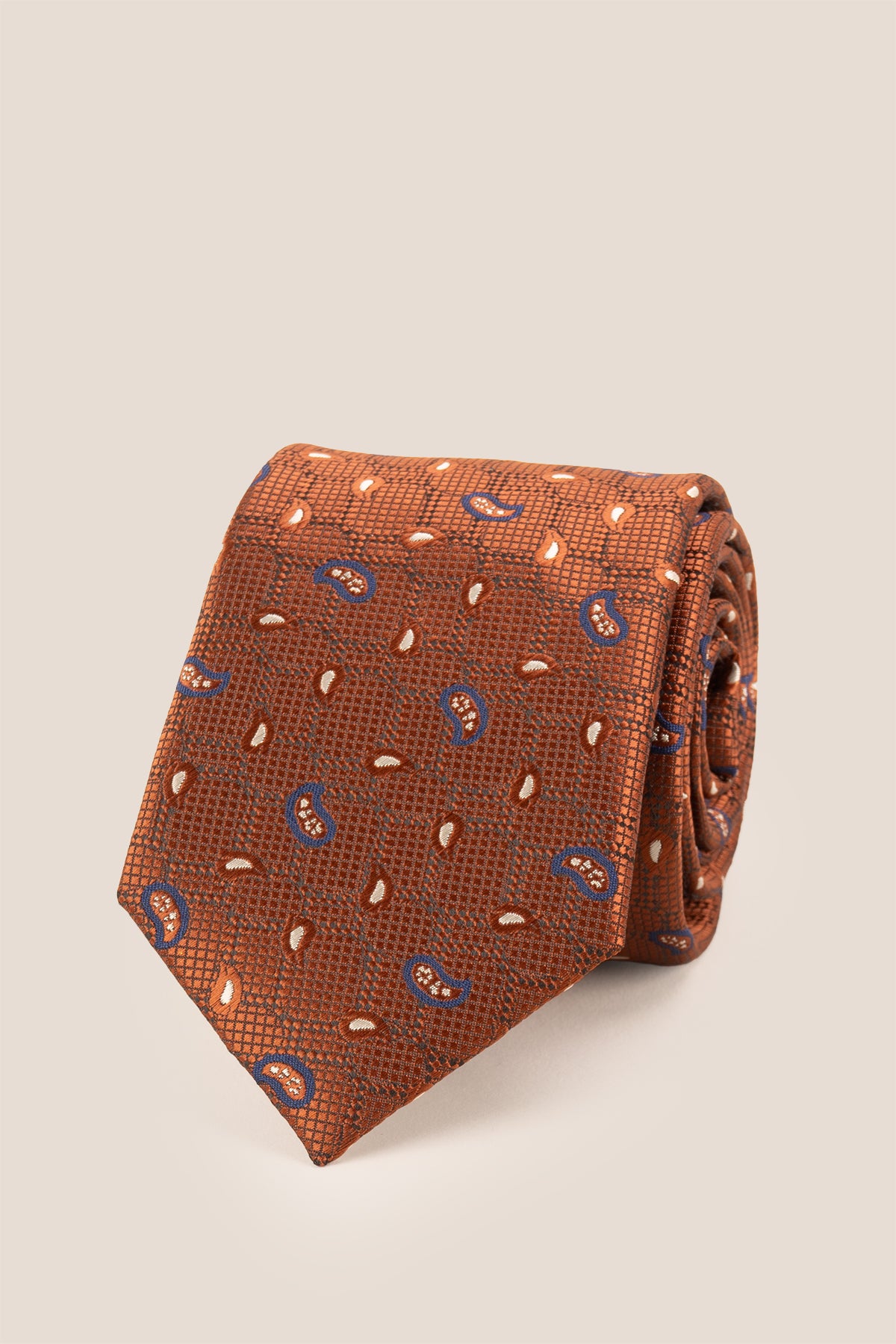 Oswin Hyde Paisley Geometric Bronze tie for men, designed to add a unique touch to your wardrobe. The intricate paisley and geometric patterns, combined with a rich bronze colour.
