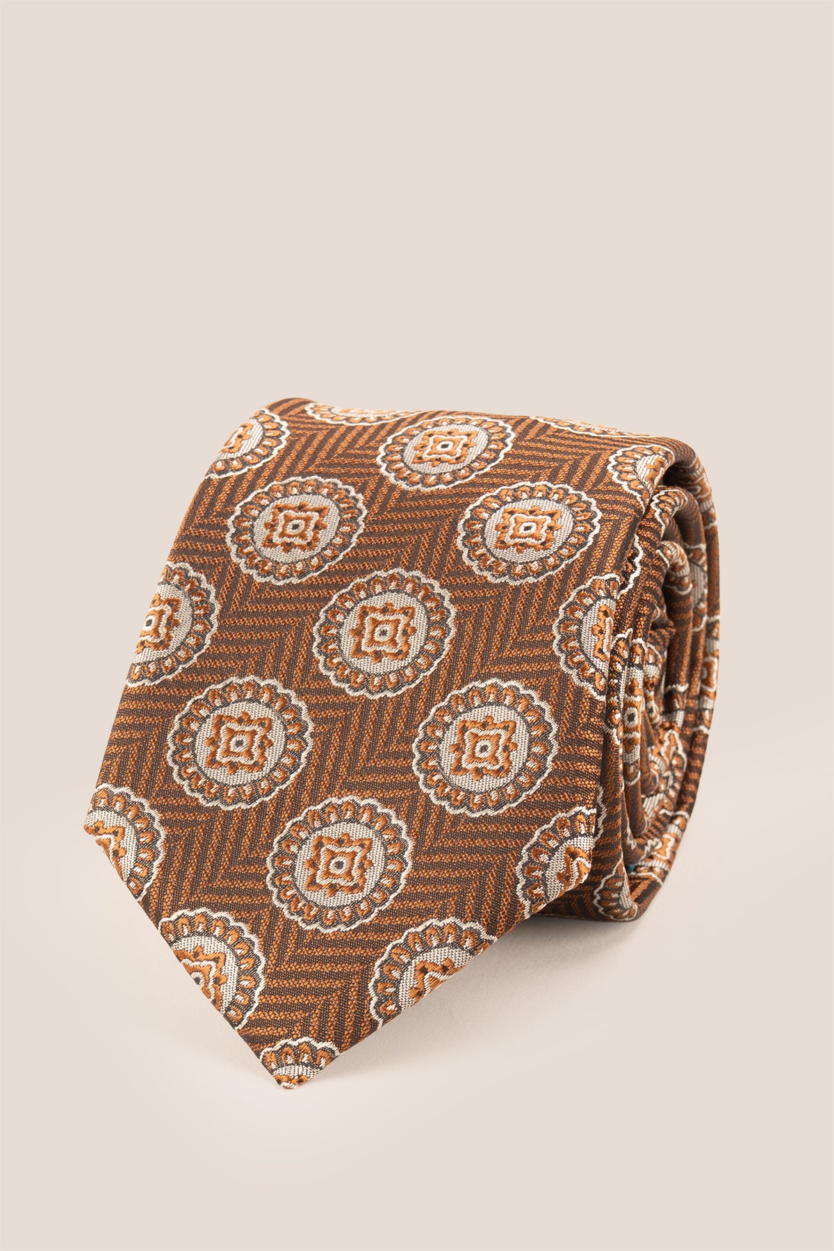 Brown Geometric Circles tie for men. Featuring a striking geometric circle pattern in rich brown
