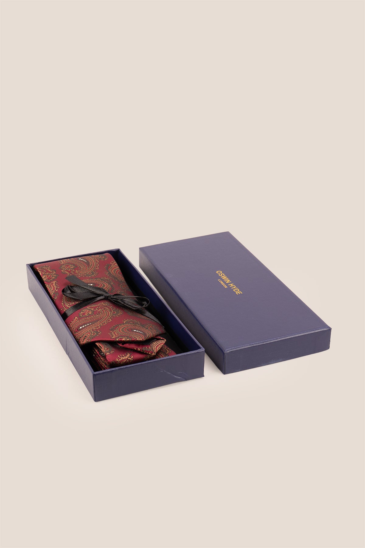 Red Copper Paisley ties for men. The vibrant red and copper hues, combined with intricate paisley patterns, make this tie perfect for any formal or semi-formal event.