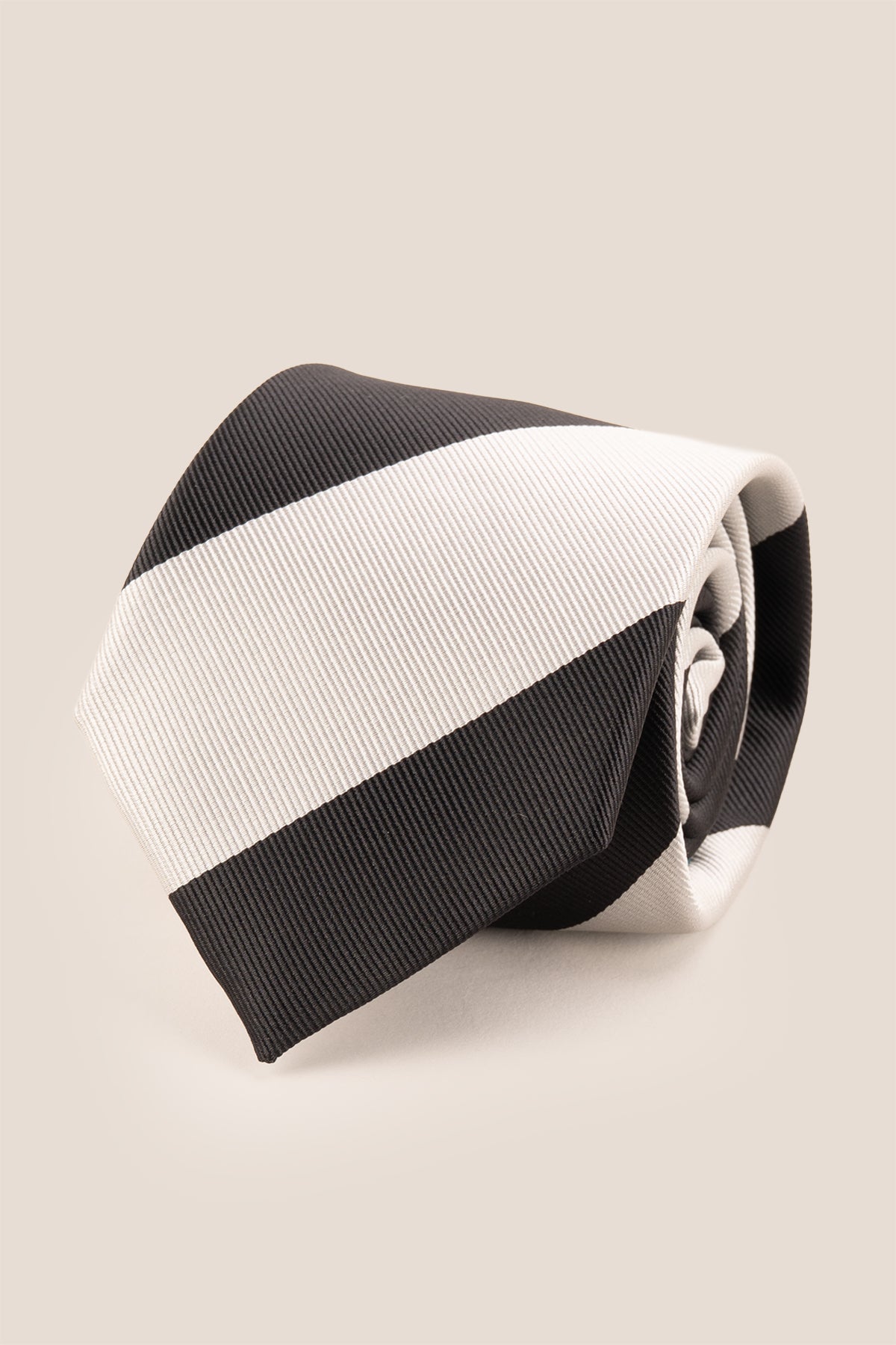 Black White Stripes tie for men, designed to add a bold and elegant touch to your wardrobe. Featuring striking black and white stripes made from high quality materials.