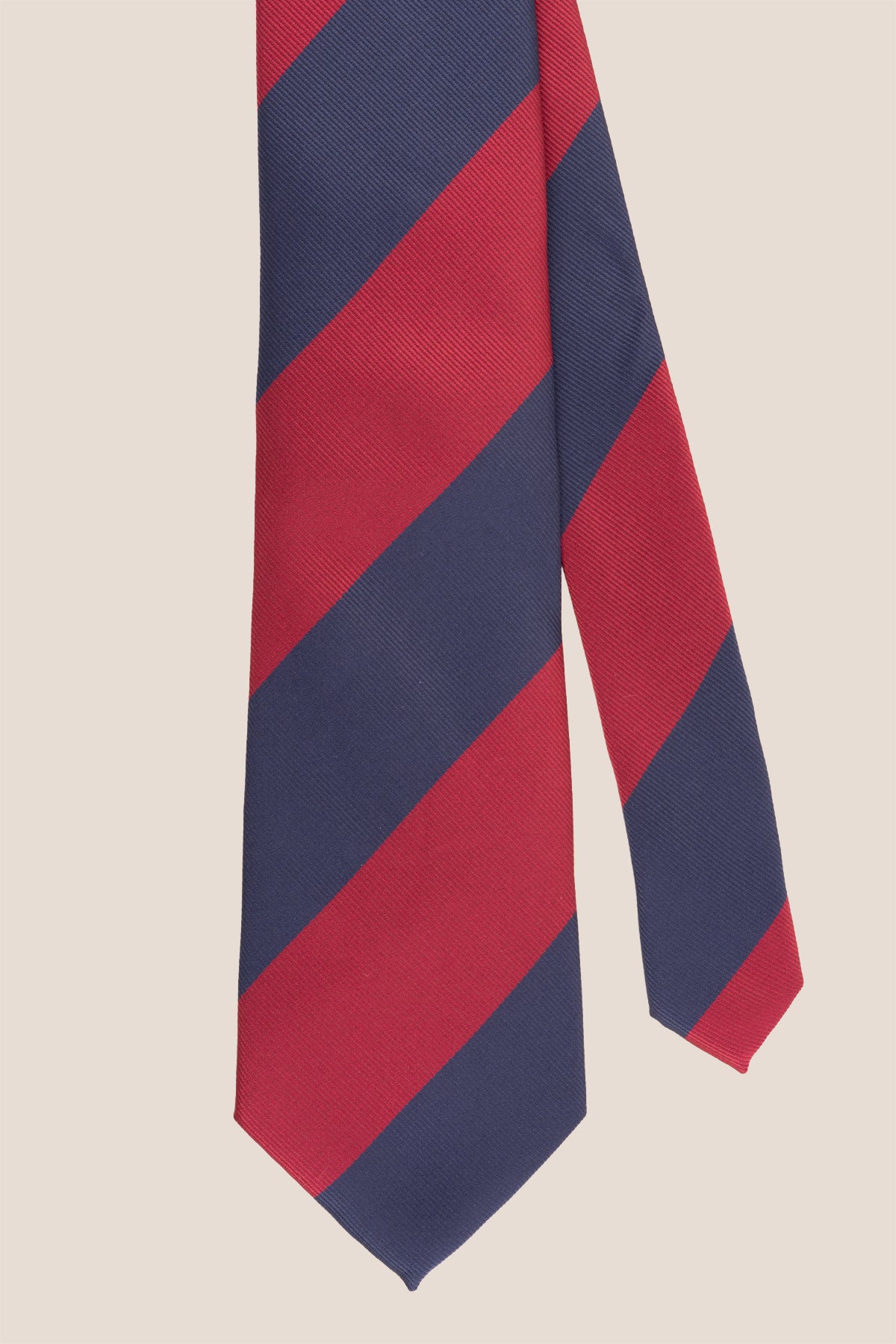 Red Navy Stripes tie for men, designed to add a bold and elegant touch to your wardrobe. Featuring striking red and navy stripes made from high quality materials.